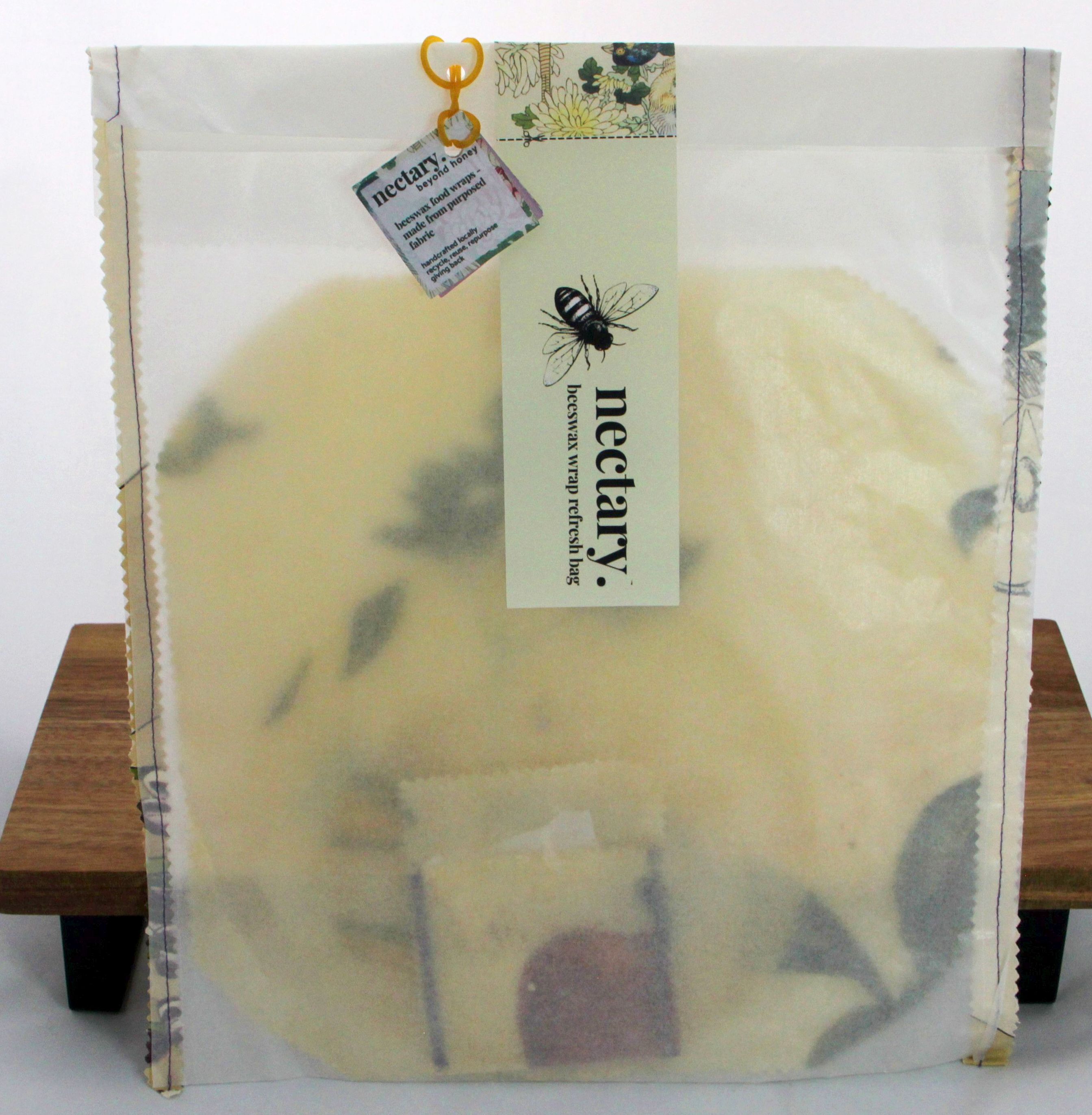 beeswax wrap refresh bag & wax (no wraps included).