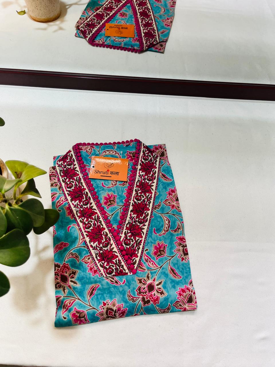 Chic Blue Floral Short Kurta with V-Neck Detailing – Perfect for Jeans