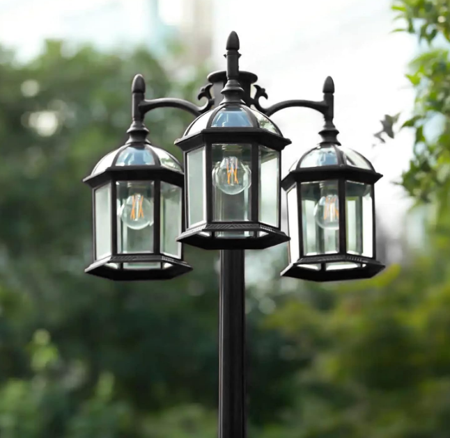 Dusk to Dawn Outdoor Lamp Post Light with GFCI Outlet, Triple Head Aluminum Street Light Post for Outside with Sensor, Waterproof Birdcage Pole Lighting Fixture for Backyard Garden Patio Driveway