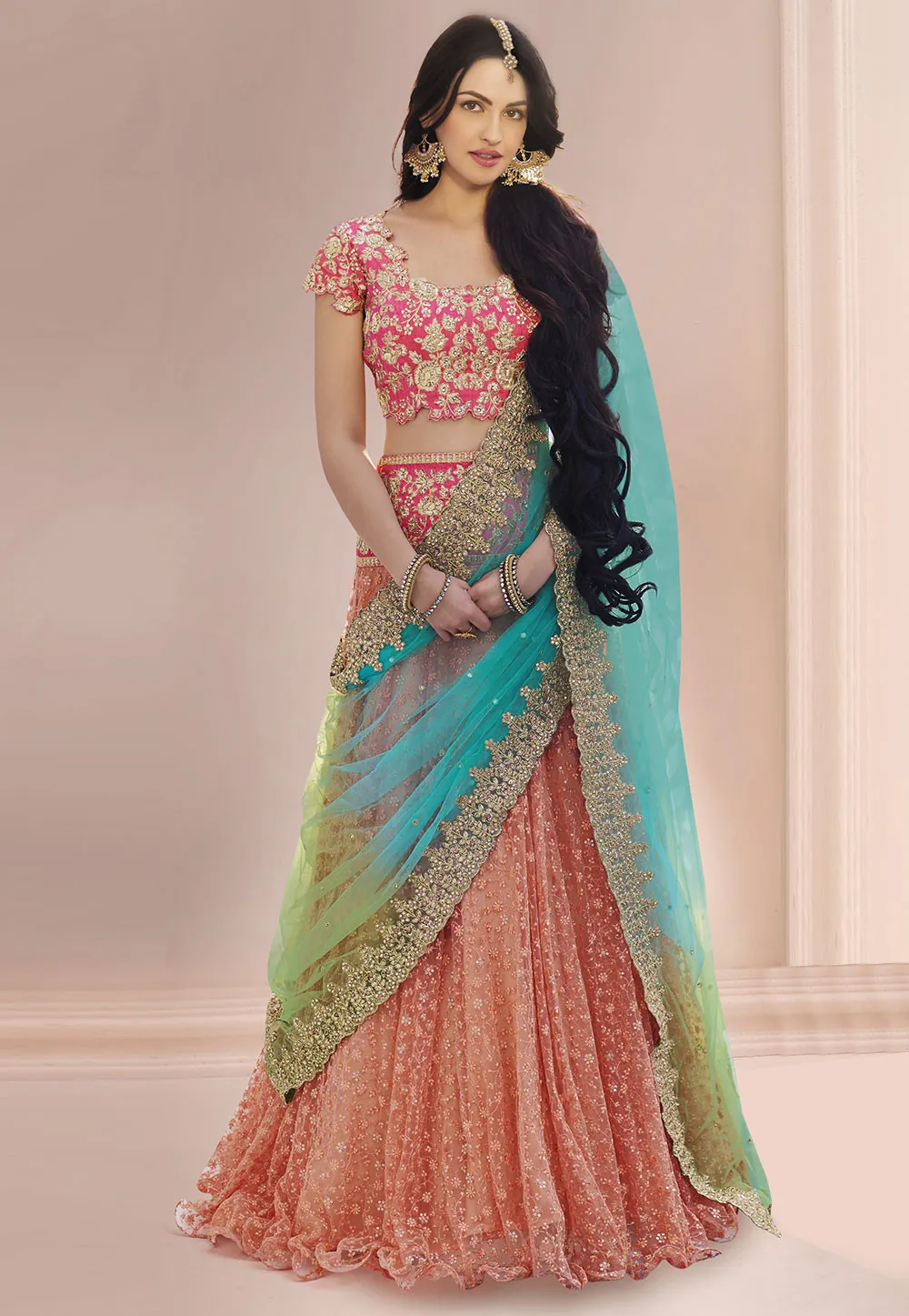 Embroidered Net Wedding Lehenga in Peach Color