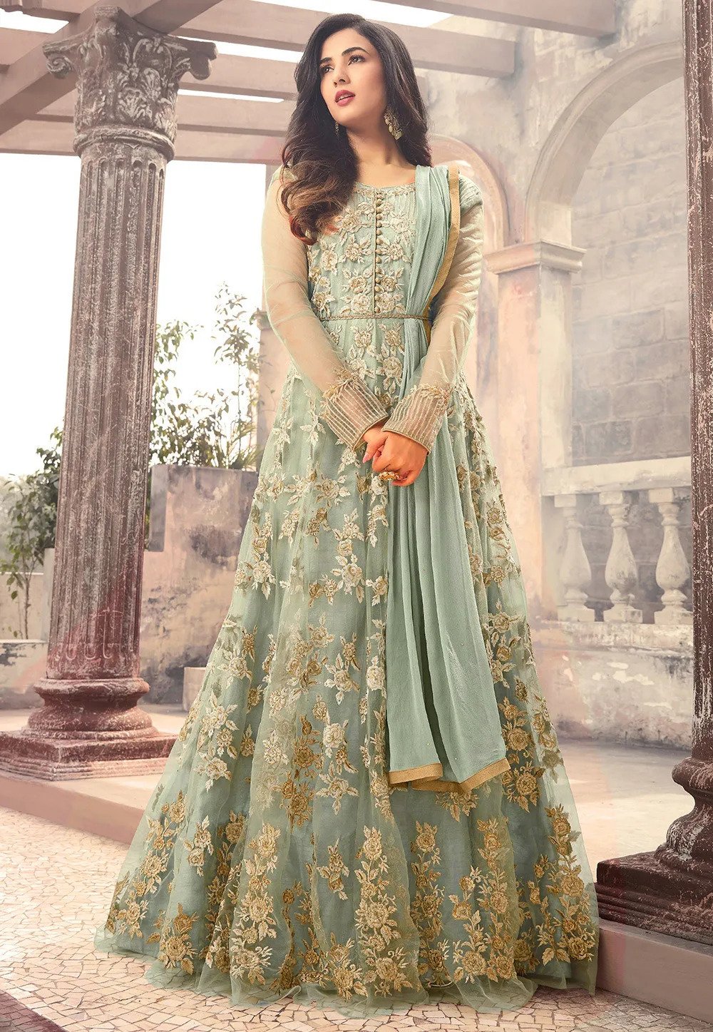 Bollywood Diva Sonal Chauhan Embroidered Net Abaya Style Suit In Pastel Blue Color