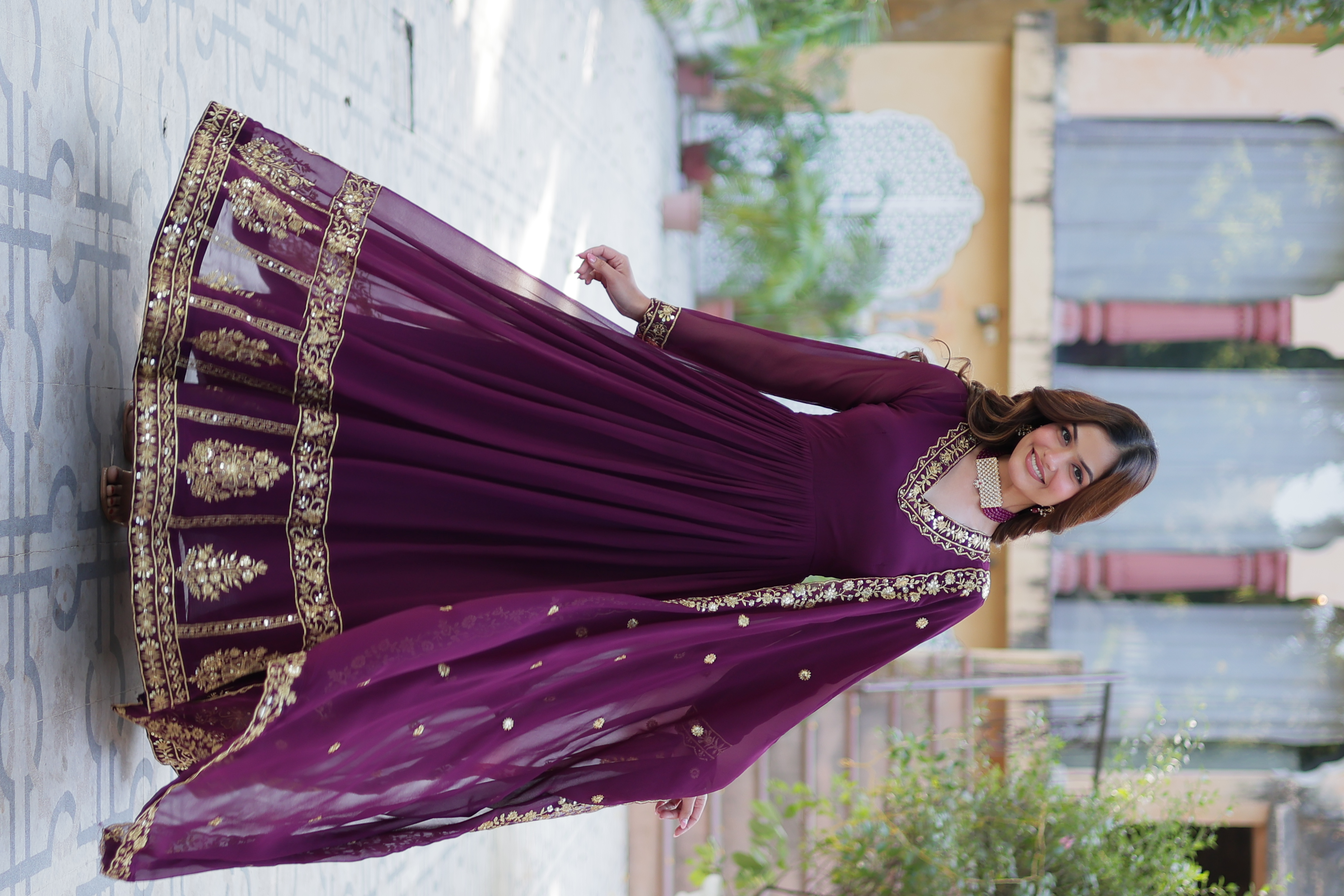 The elegant purple anarkali salwar kameez, specially crafted for the festive occasion of Eid