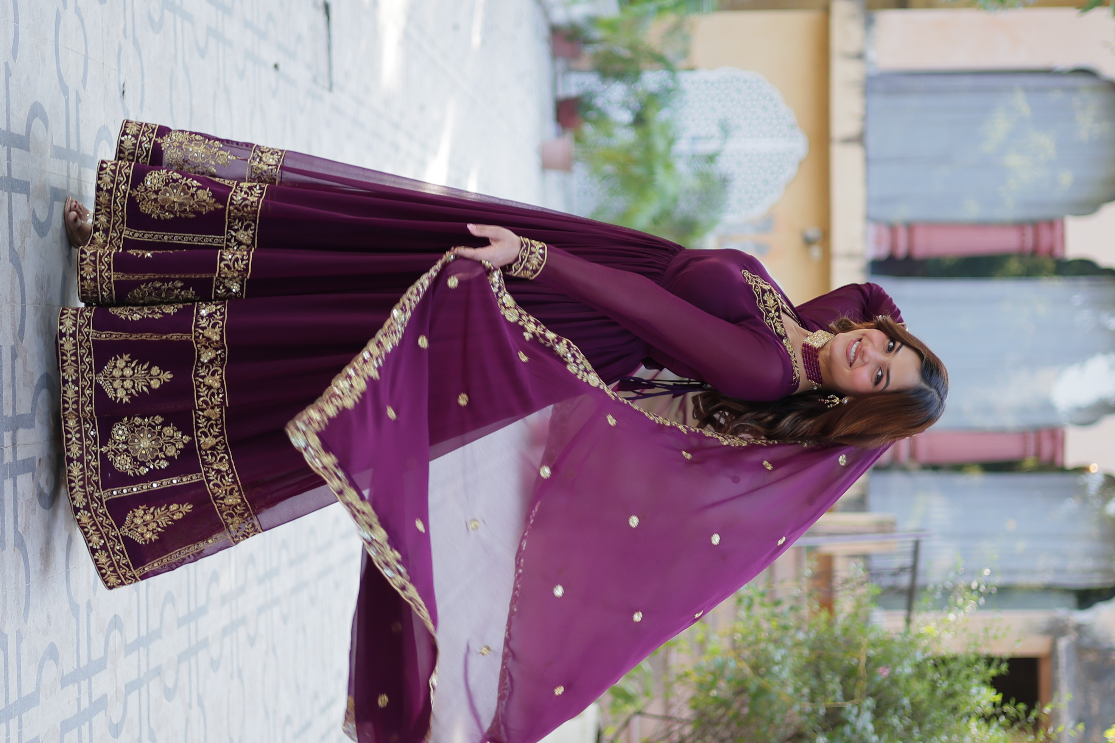 The elegant purple anarkali salwar kameez, specially crafted for the festive occasion of Eid