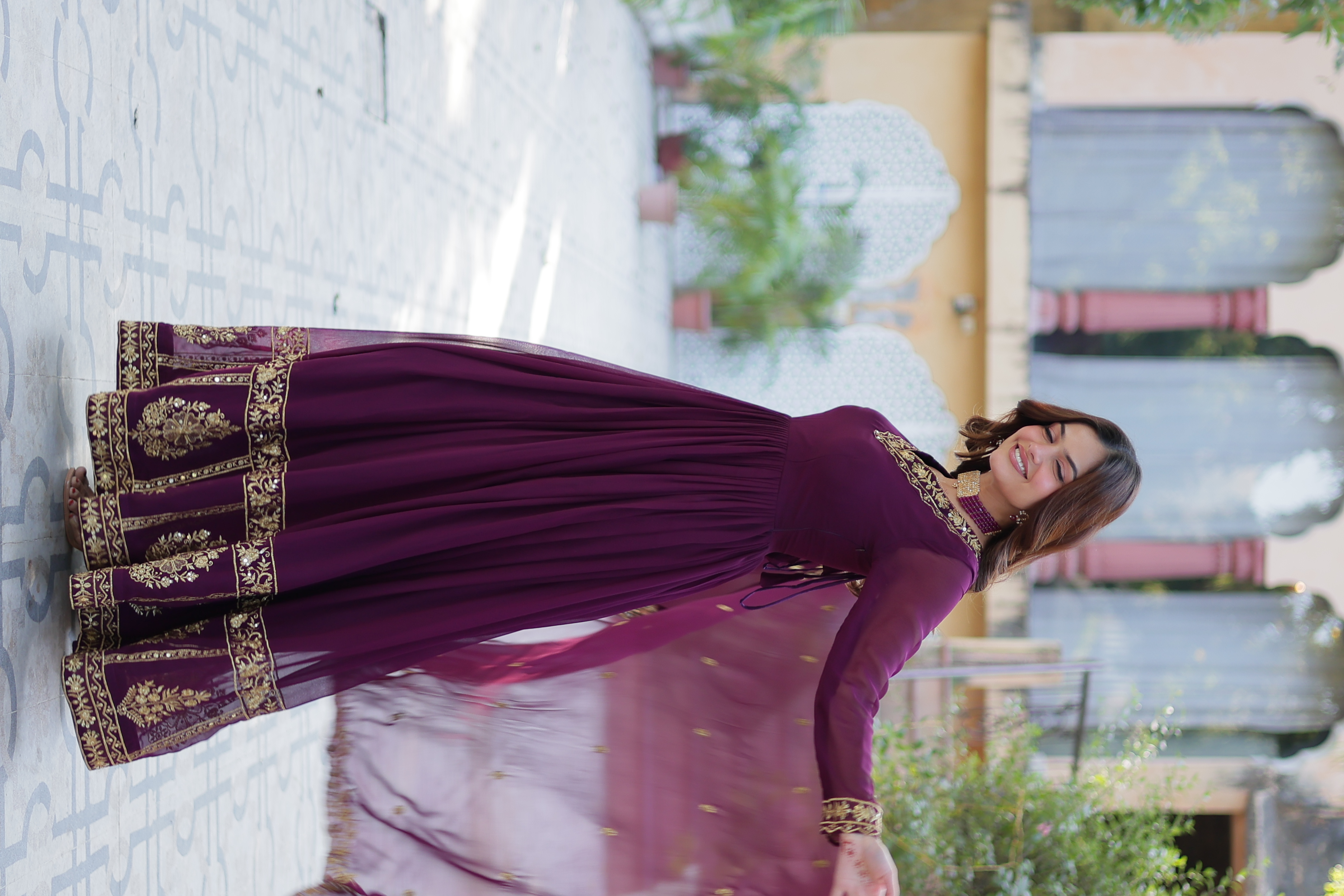 The elegant purple anarkali salwar kameez, specially crafted for the festive occasion of Eid