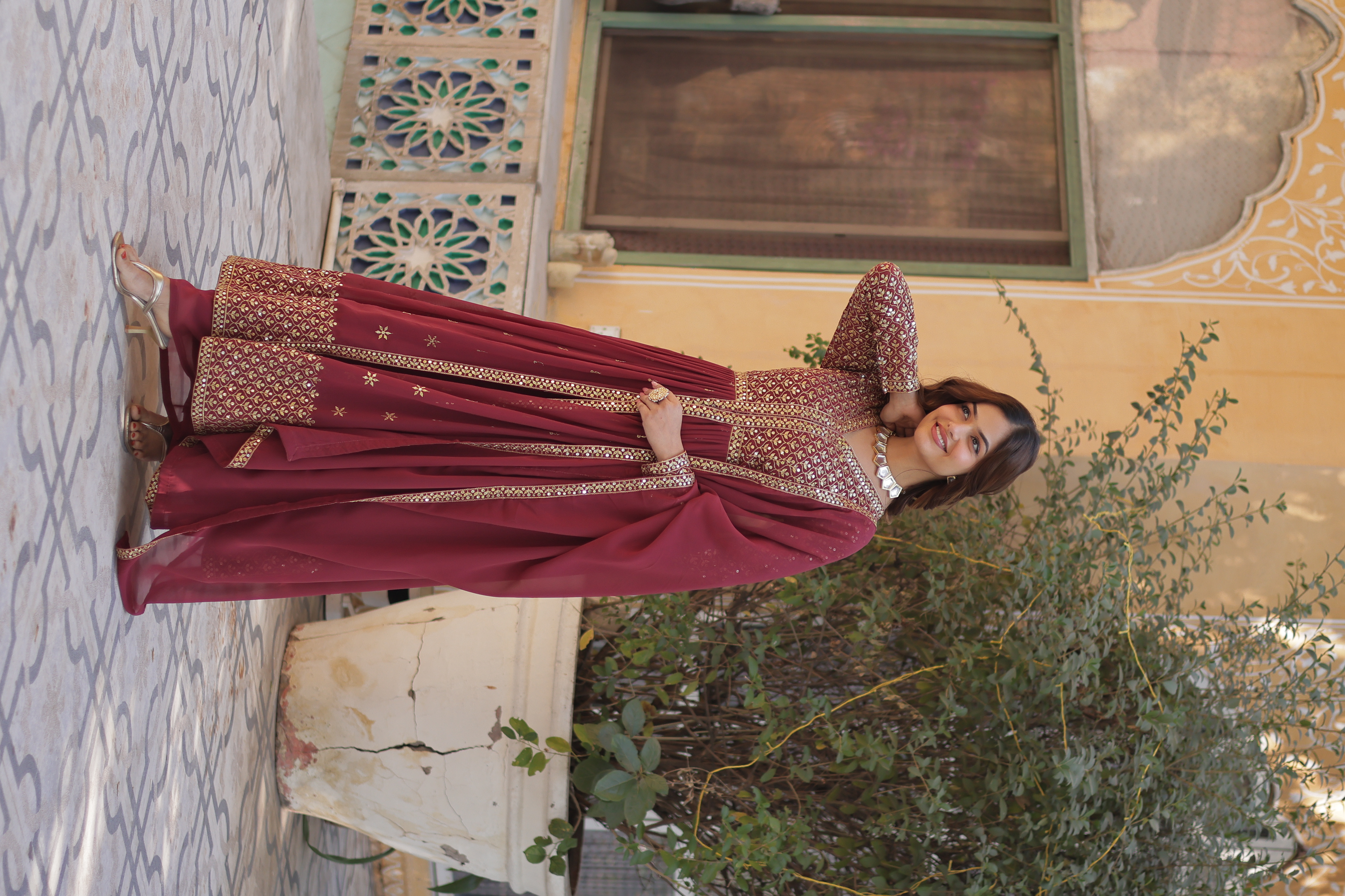 The intricate embossed zari thread work and studded sequins add a unique texture and gleam Anarkali Salwar Kameez