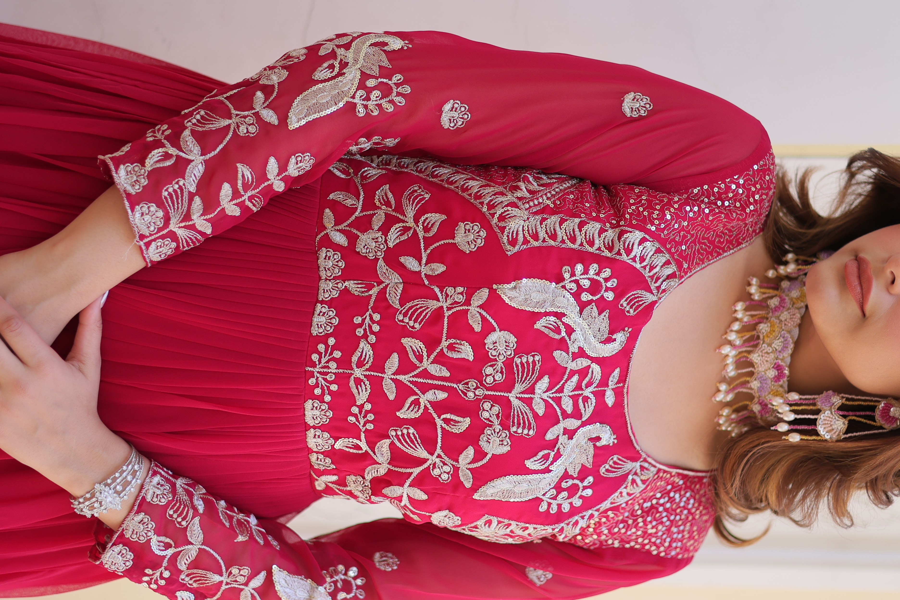 This vibrant pink gown is the perfect choice for your Eid celebrations