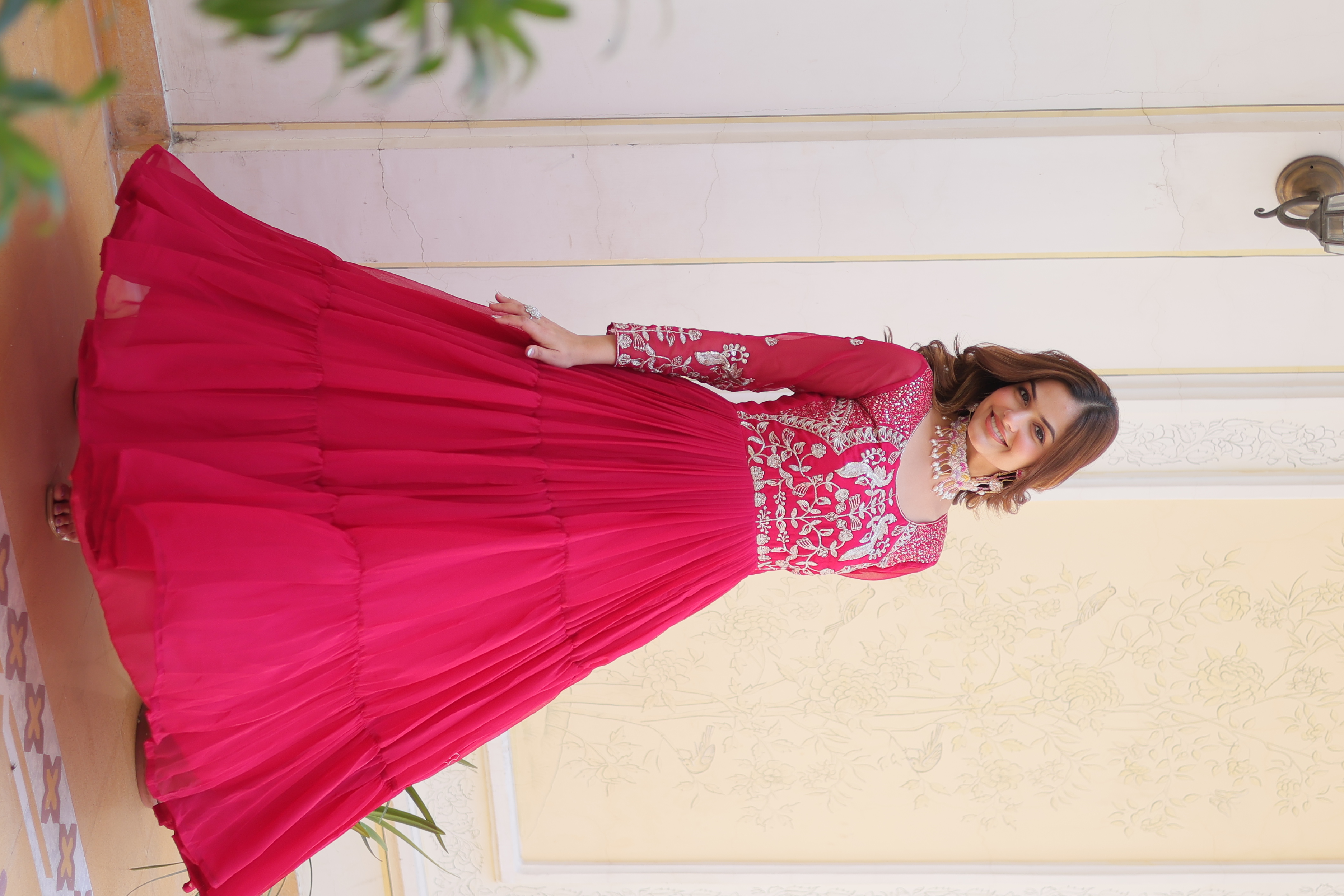 This vibrant pink gown is the perfect choice for your Eid celebrations