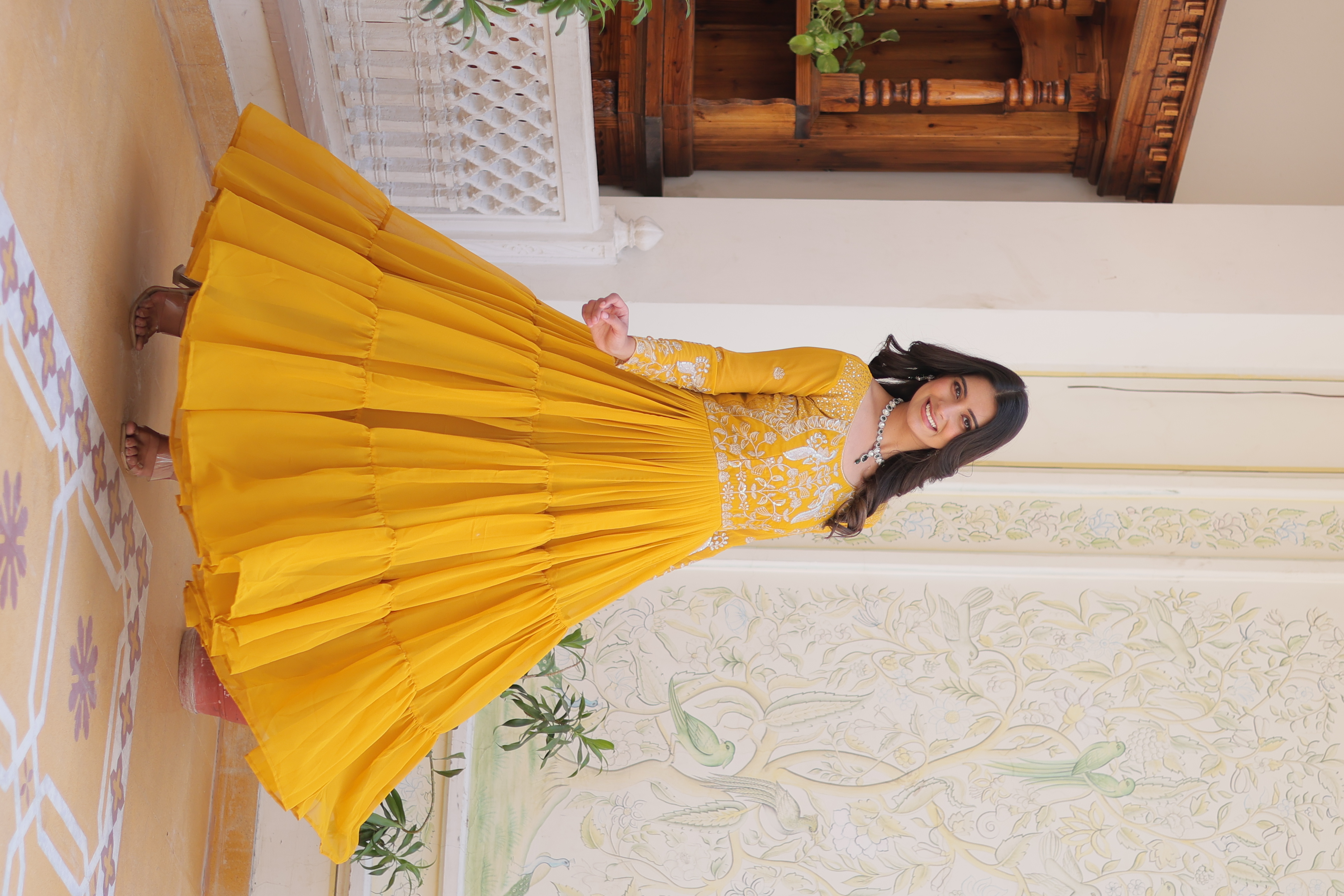 This vibrant Yellow gown is the perfect choice for your Eid celebrations