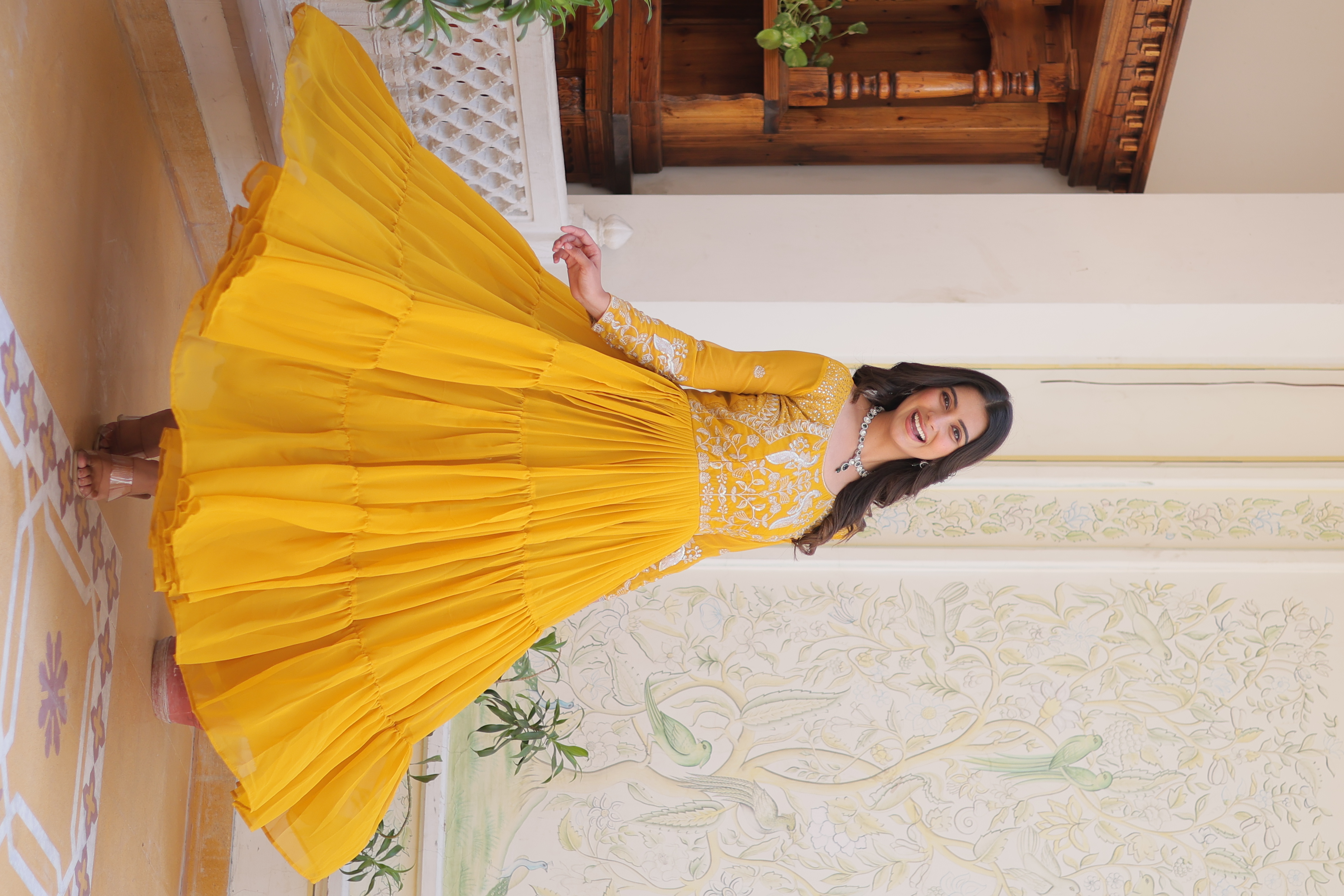 This vibrant Yellow gown is the perfect choice for your Eid celebrations
