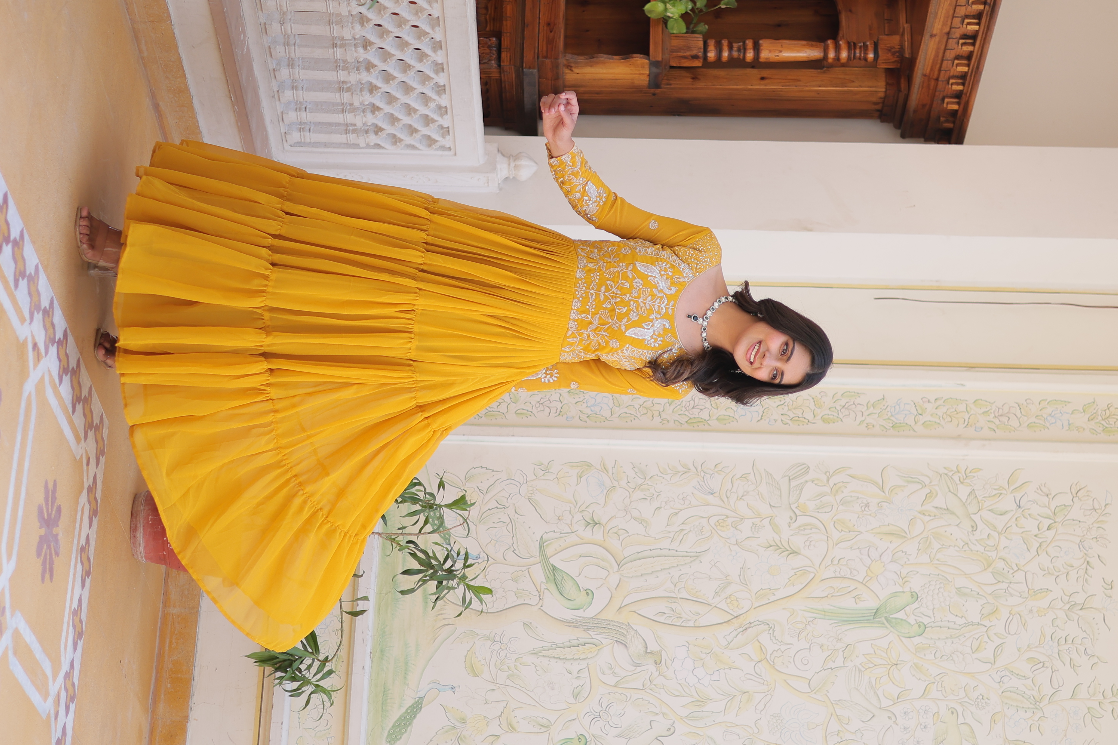 This vibrant Yellow gown is the perfect choice for your Eid celebrations