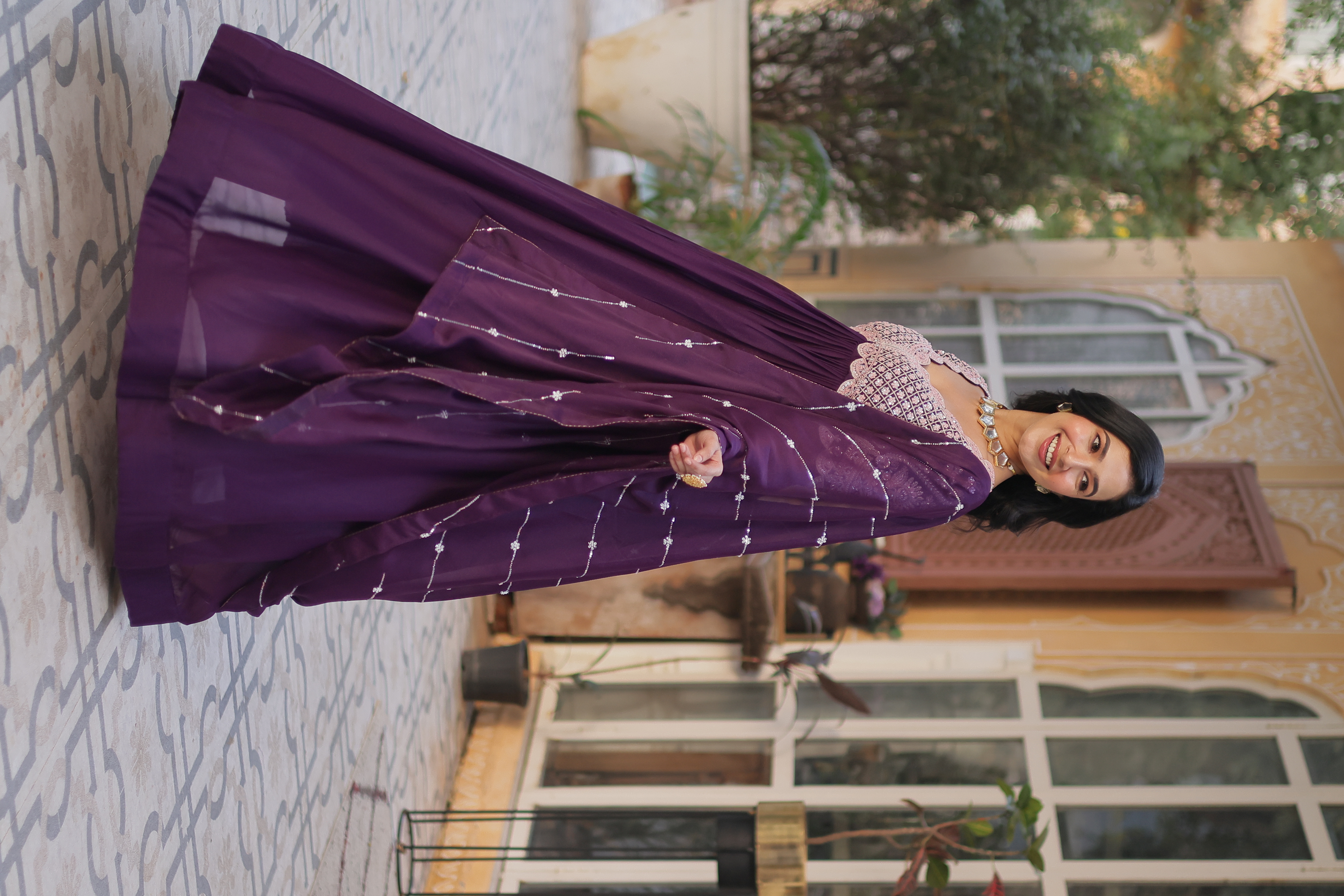 The enchanting allure of sequinned embroidery on purple georgette fabric makes this Purple Dream Gown