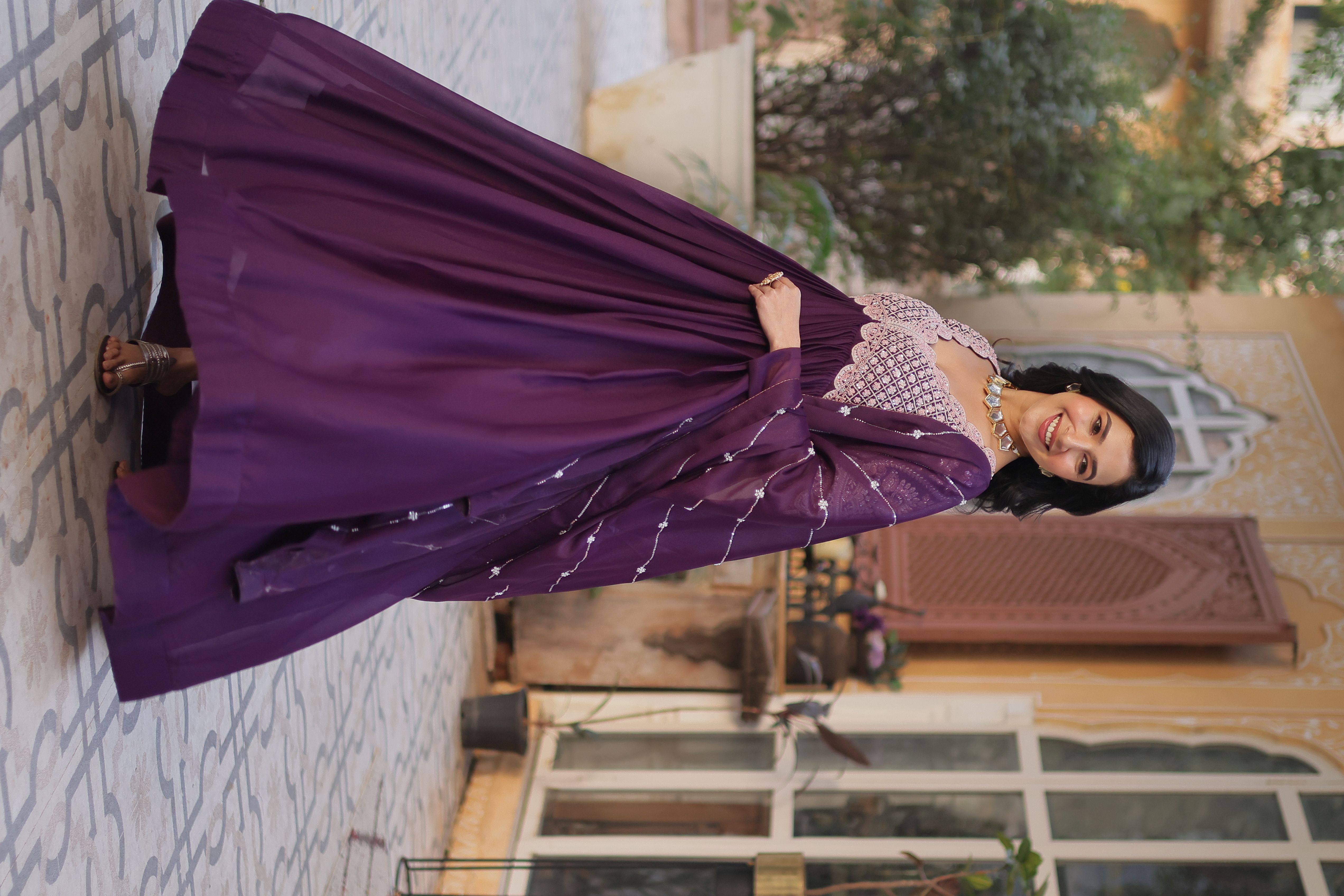 The enchanting allure of sequinned embroidery on purple georgette fabric makes this Purple Dream Gown