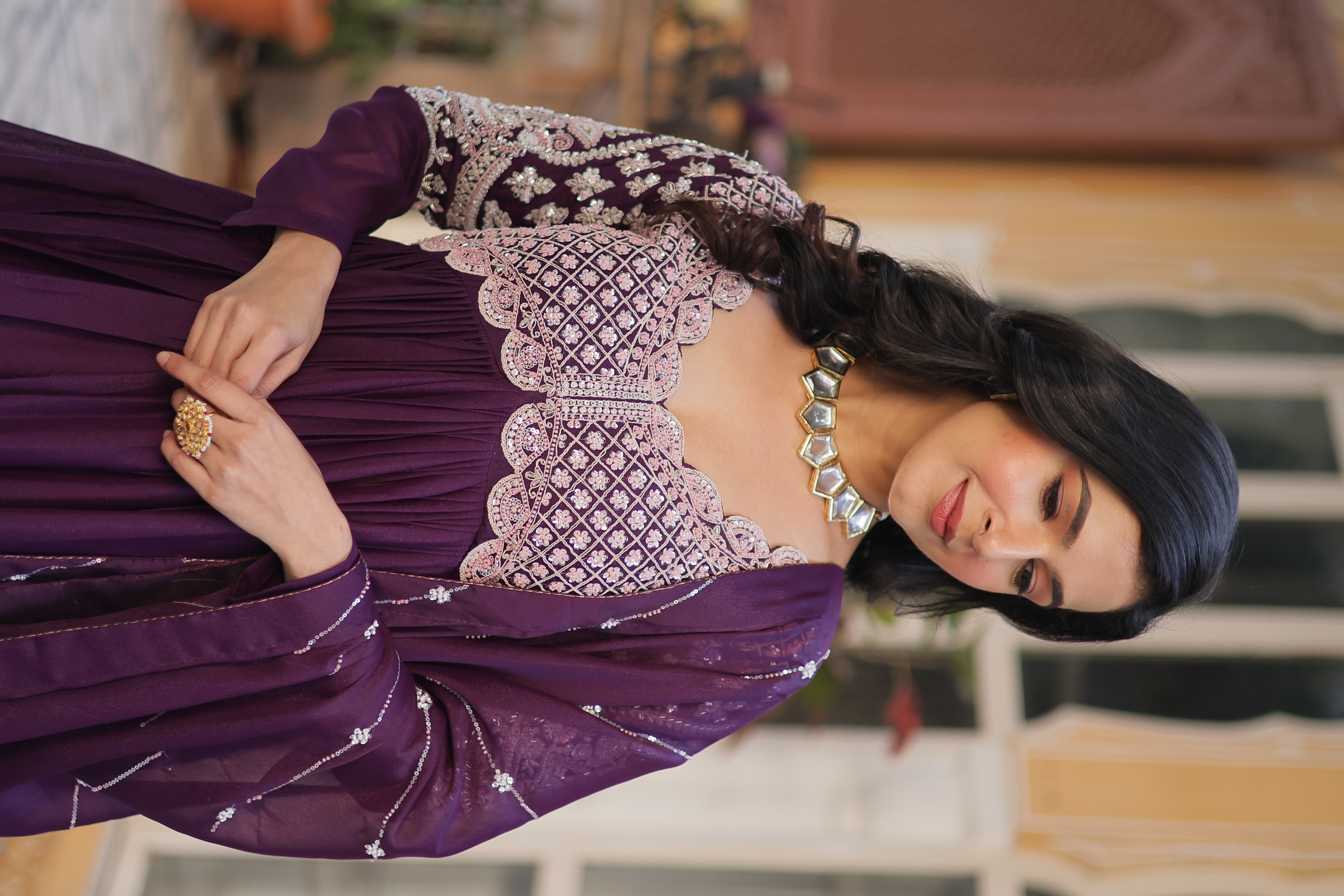 The enchanting allure of sequinned embroidery on purple georgette fabric makes this Purple Dream Gown