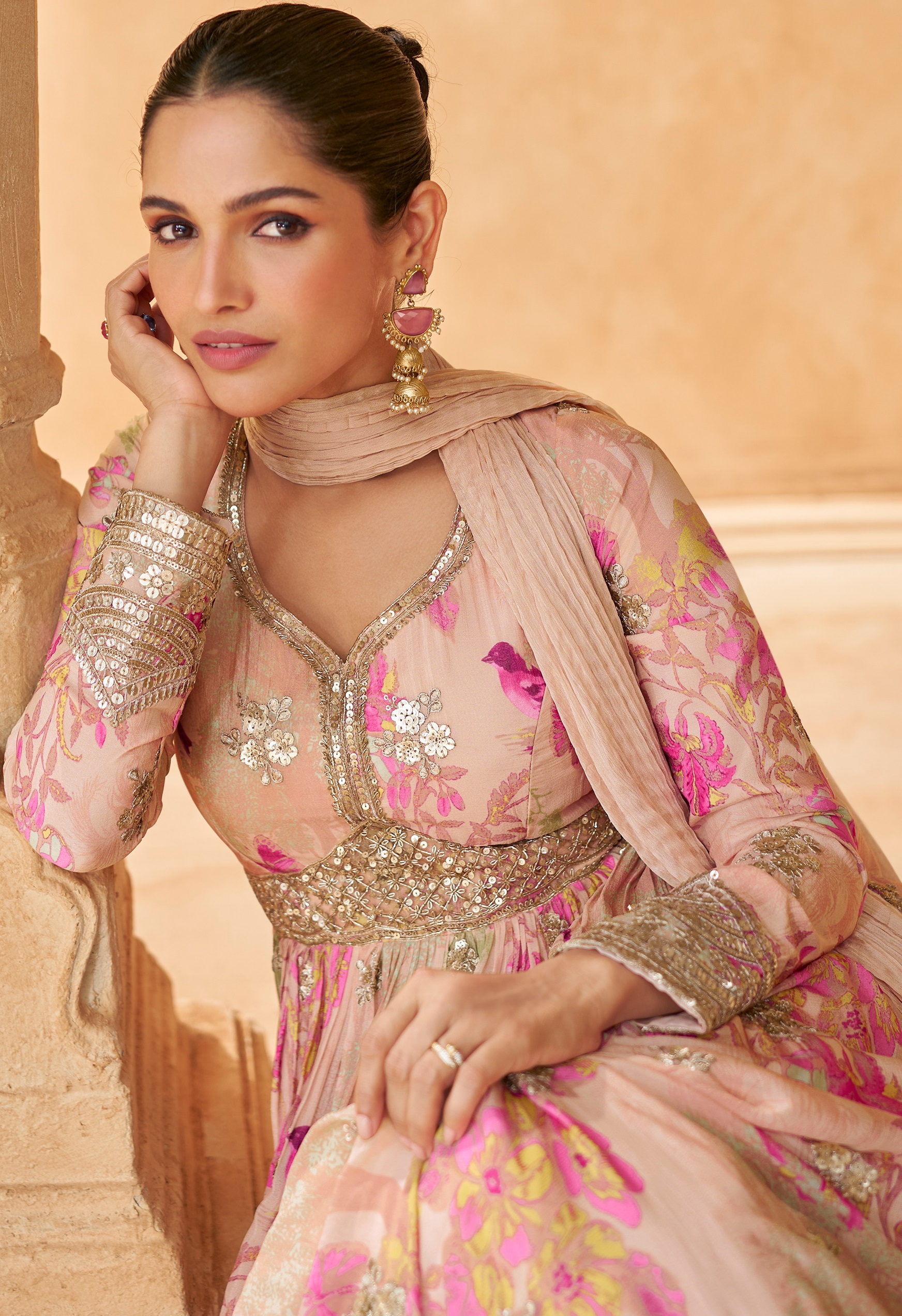 Celebrate the joy of Eid in style with this captivating gown, adorned with sequinned embroidery