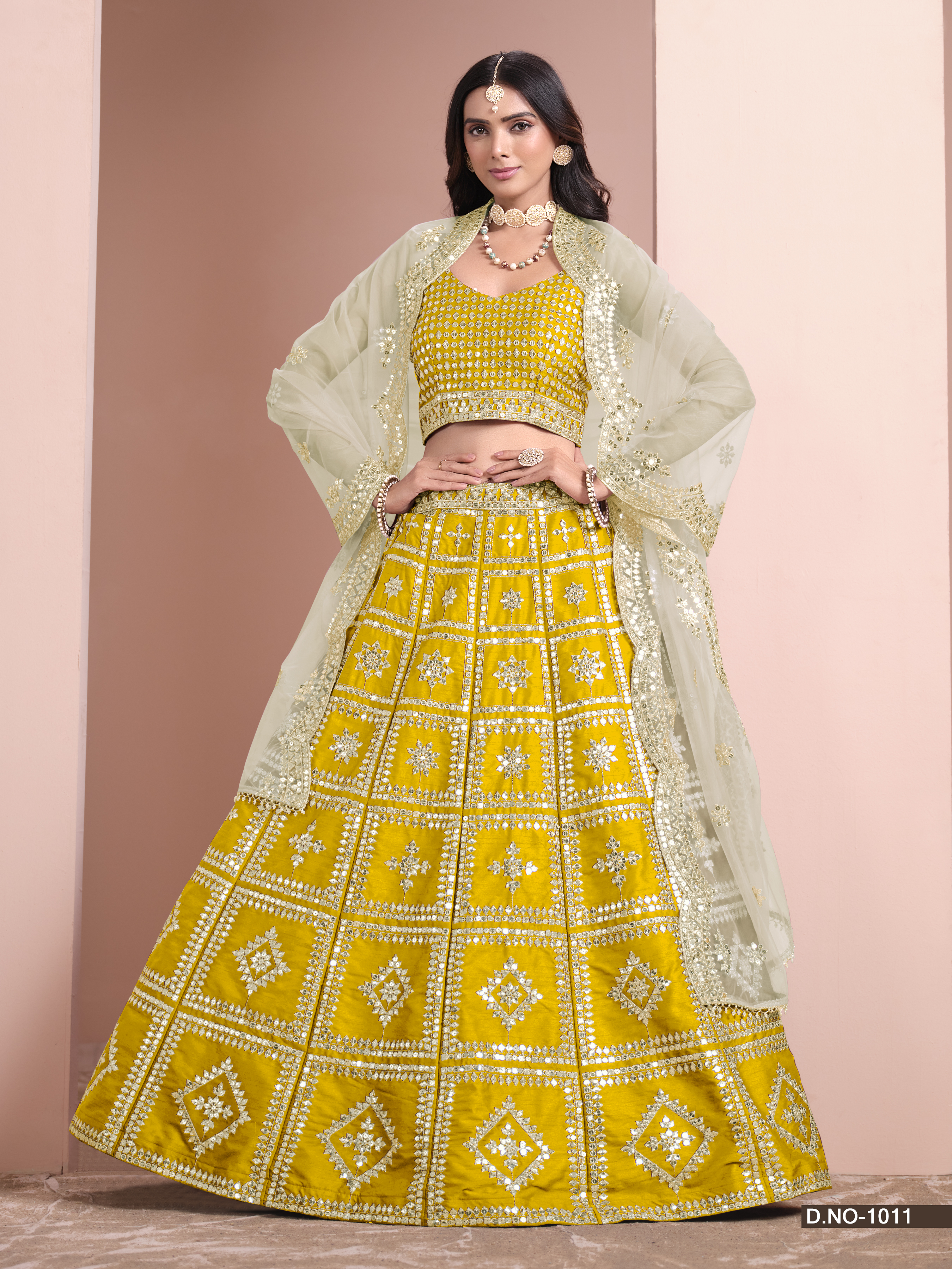 Embrace your timeless elegance with the stunning yellow art silk umbrella lehenga, a true masterpiece that celebrates your enduring beauty.