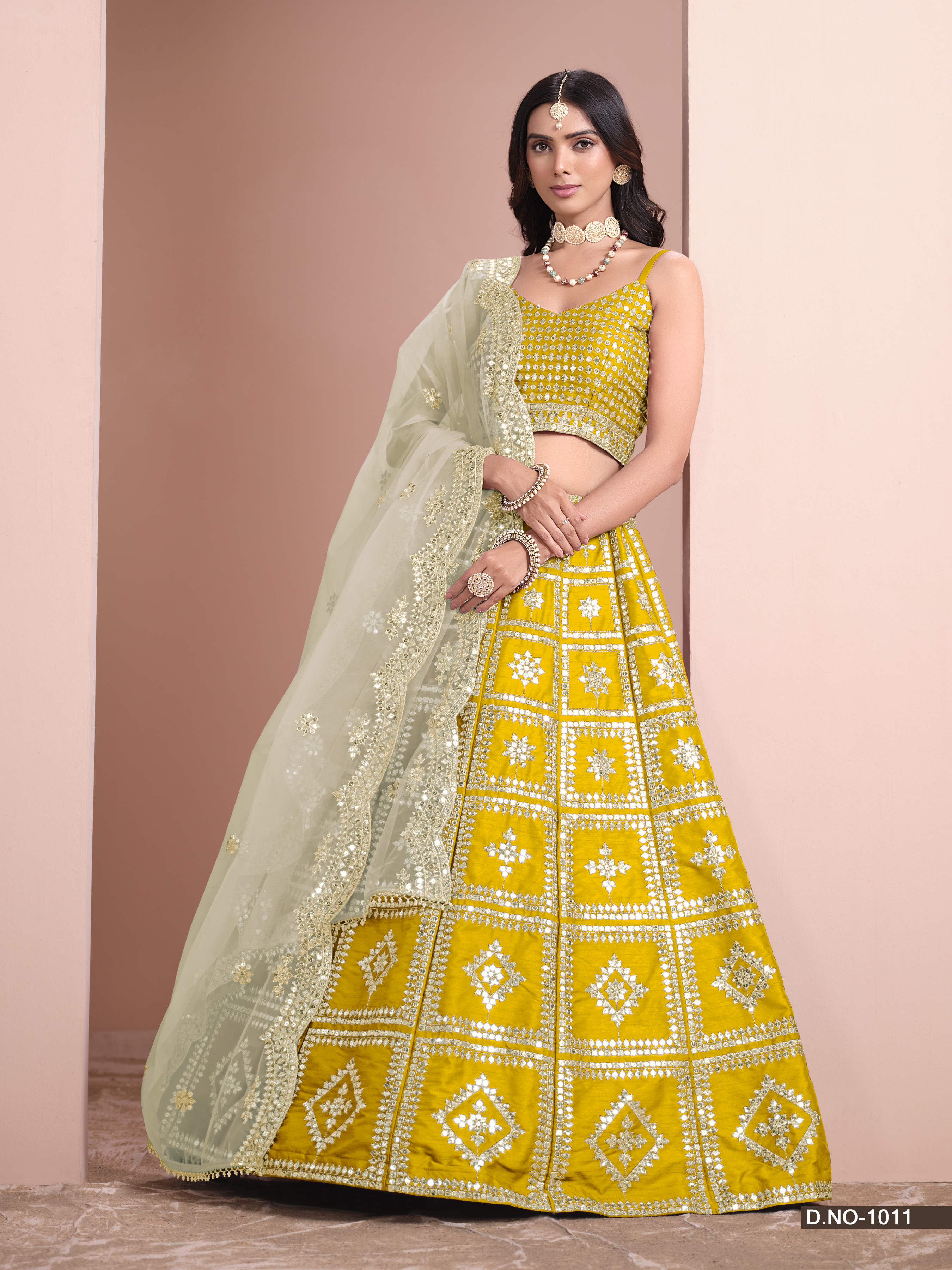 Embrace your timeless elegance with the stunning yellow art silk umbrella lehenga, a true masterpiece that celebrates your enduring beauty.