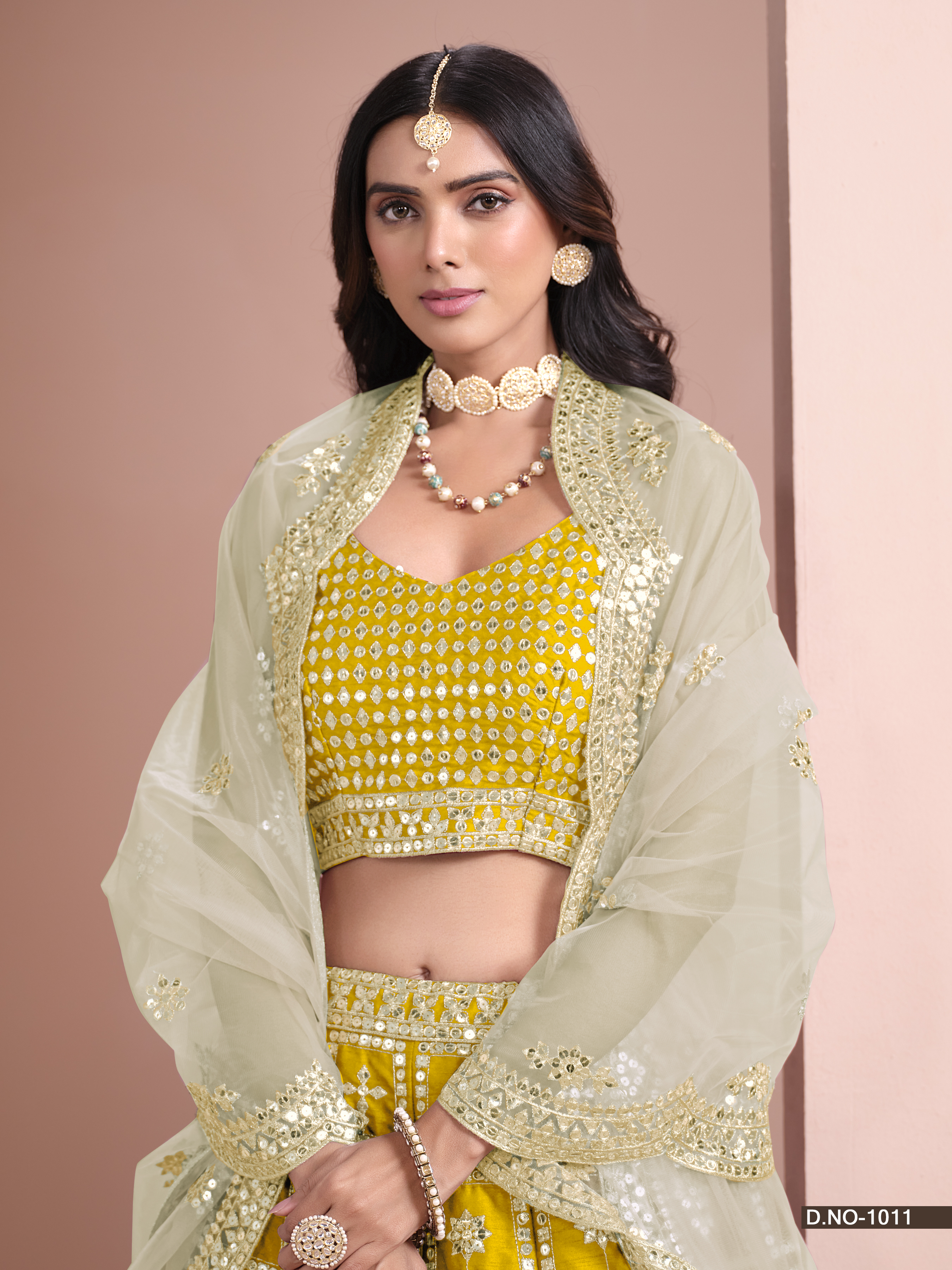 Embrace your timeless elegance with the stunning yellow art silk umbrella lehenga, a true masterpiece that celebrates your enduring beauty.