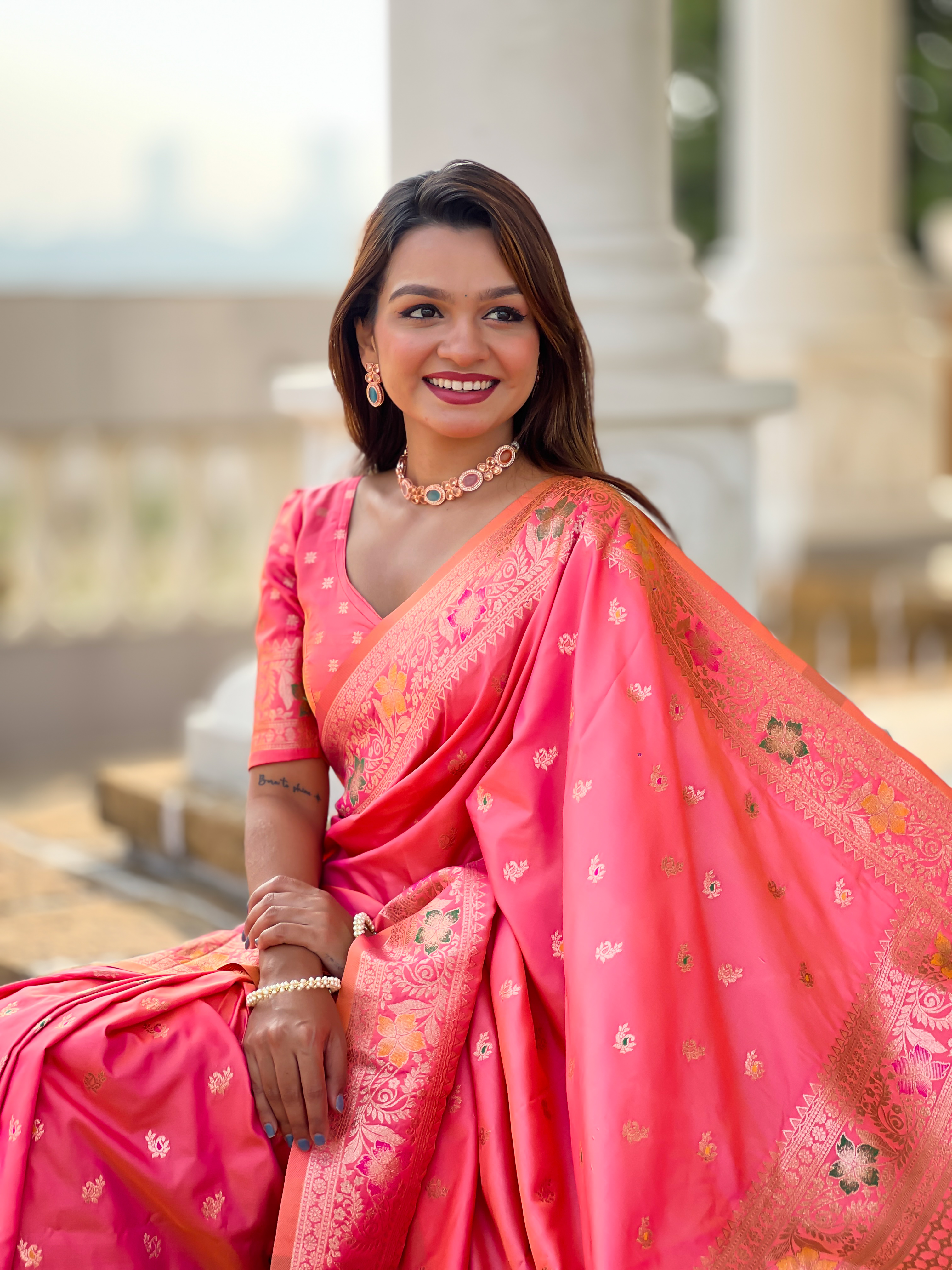 Indulge in the charm of this pink Banarasi silk saree