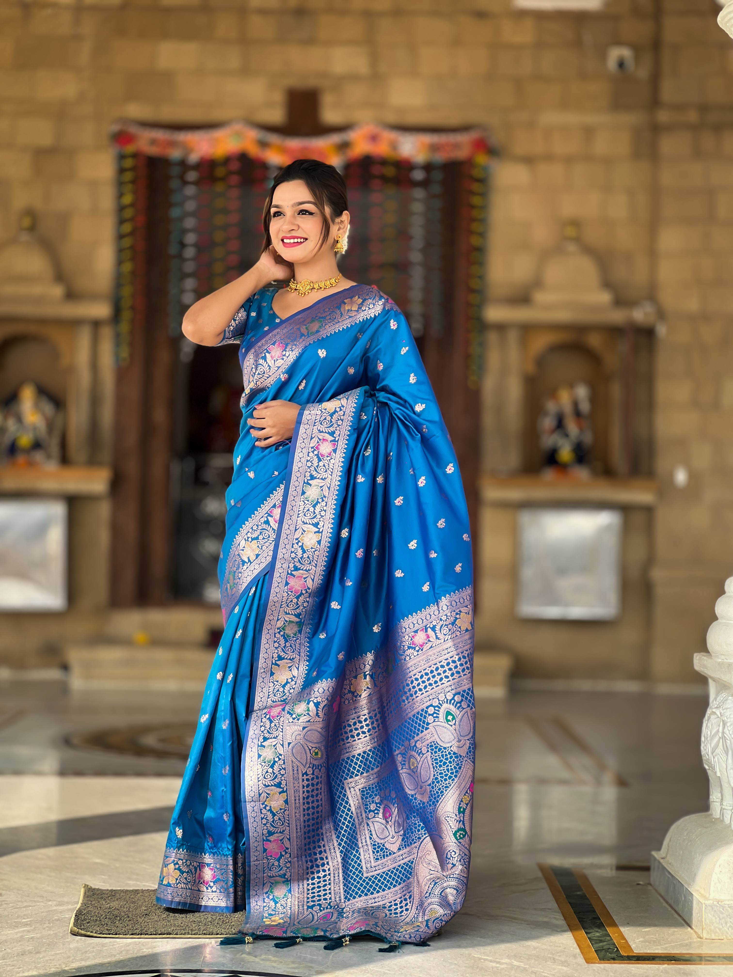 Step into grace with this stunning sky blue Banarasi silk saree