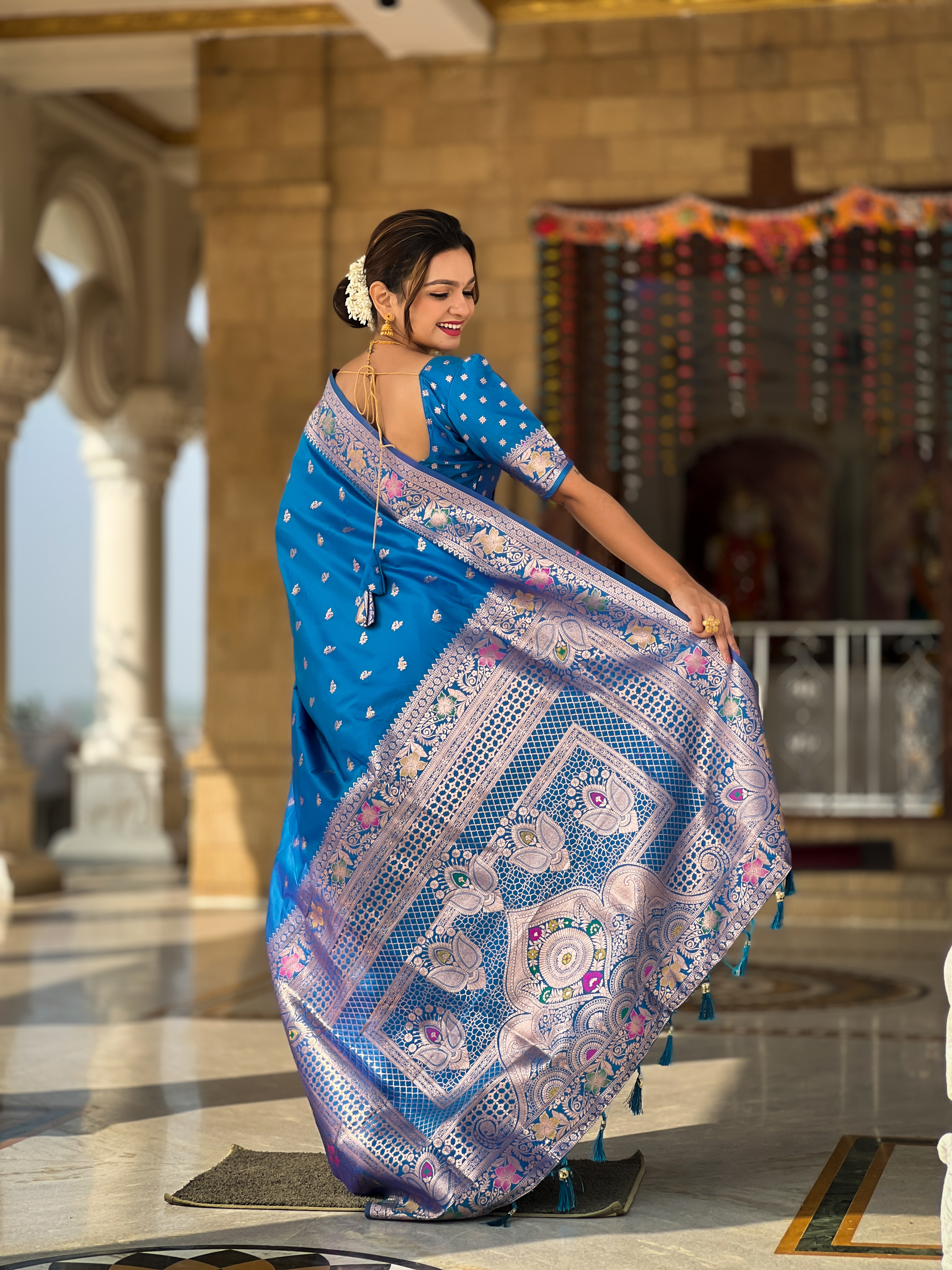 Step into grace with this stunning sky blue Banarasi silk saree