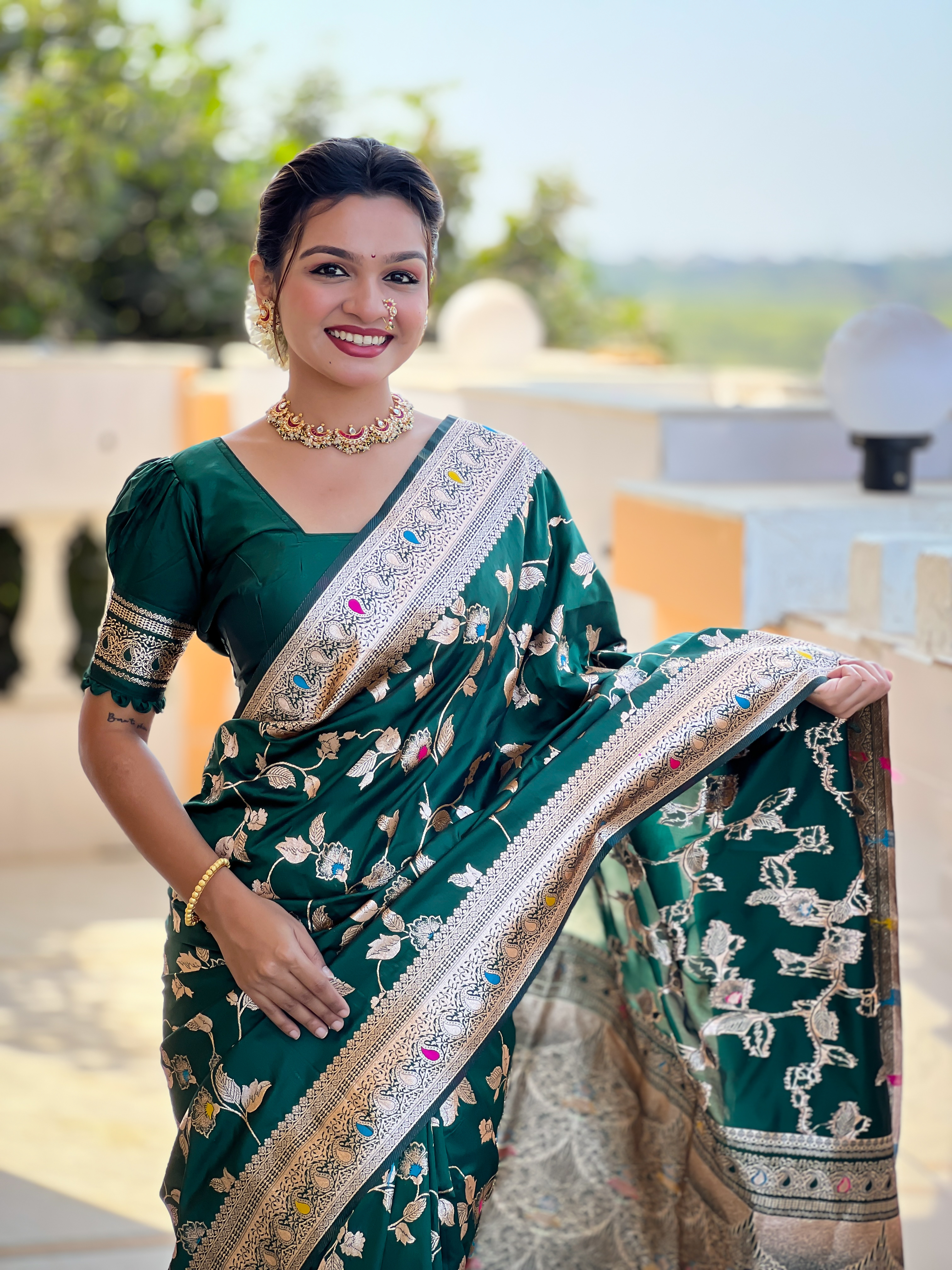 Step into elegance with this stunning bottle green Banarasi silk saree