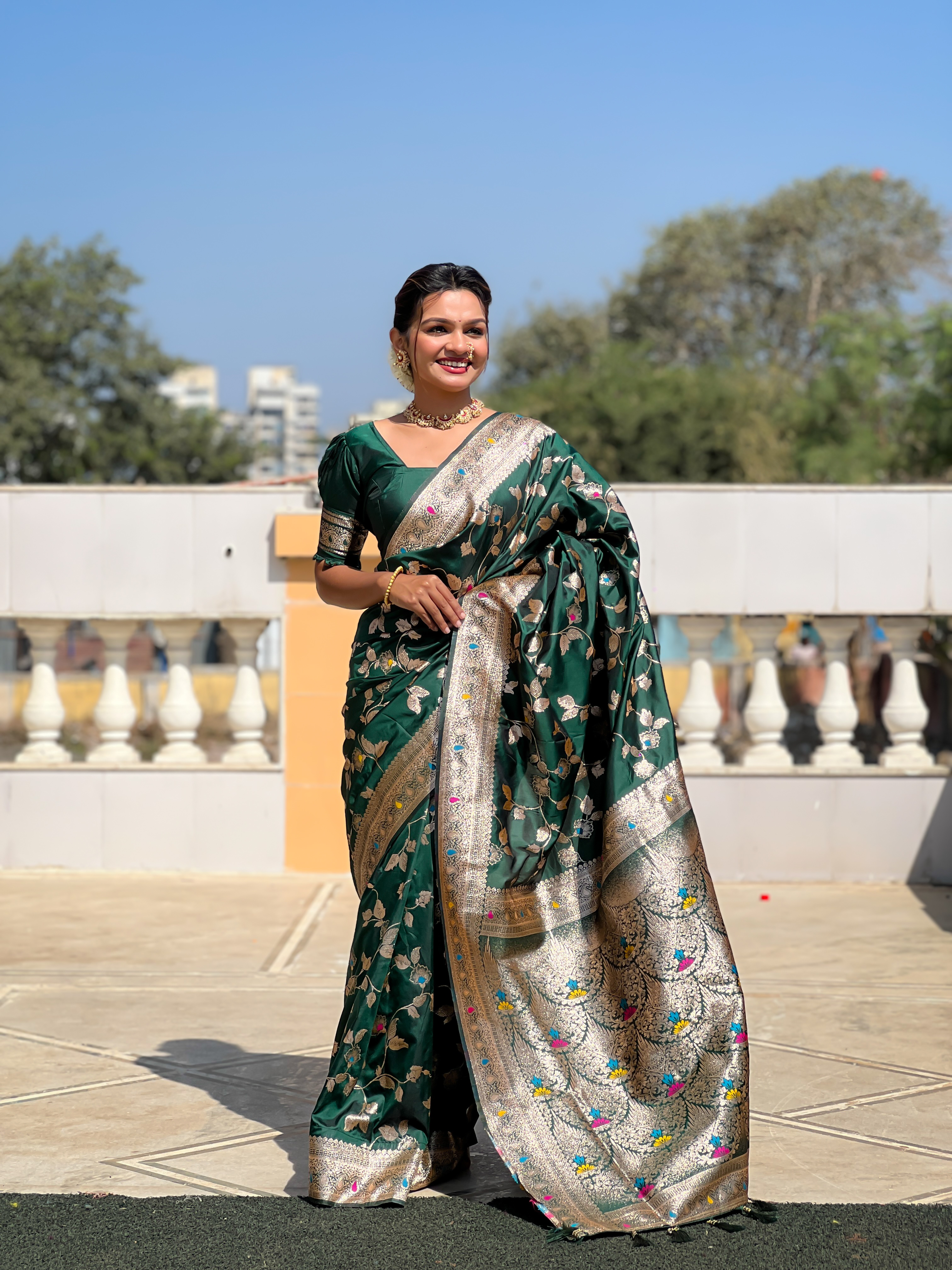 Step into elegance with this stunning bottle green Banarasi silk saree