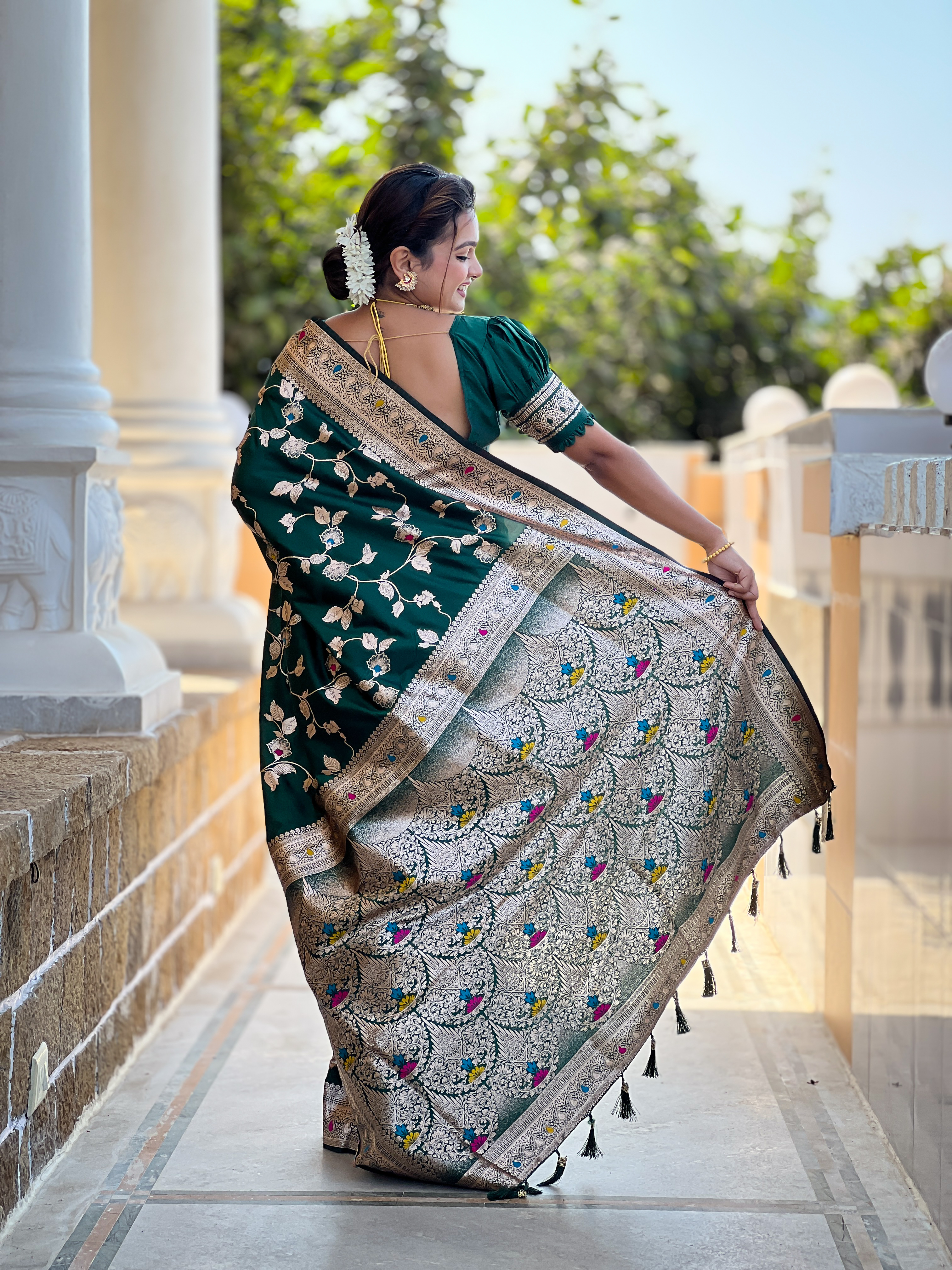 Step into elegance with this stunning bottle green Banarasi silk saree