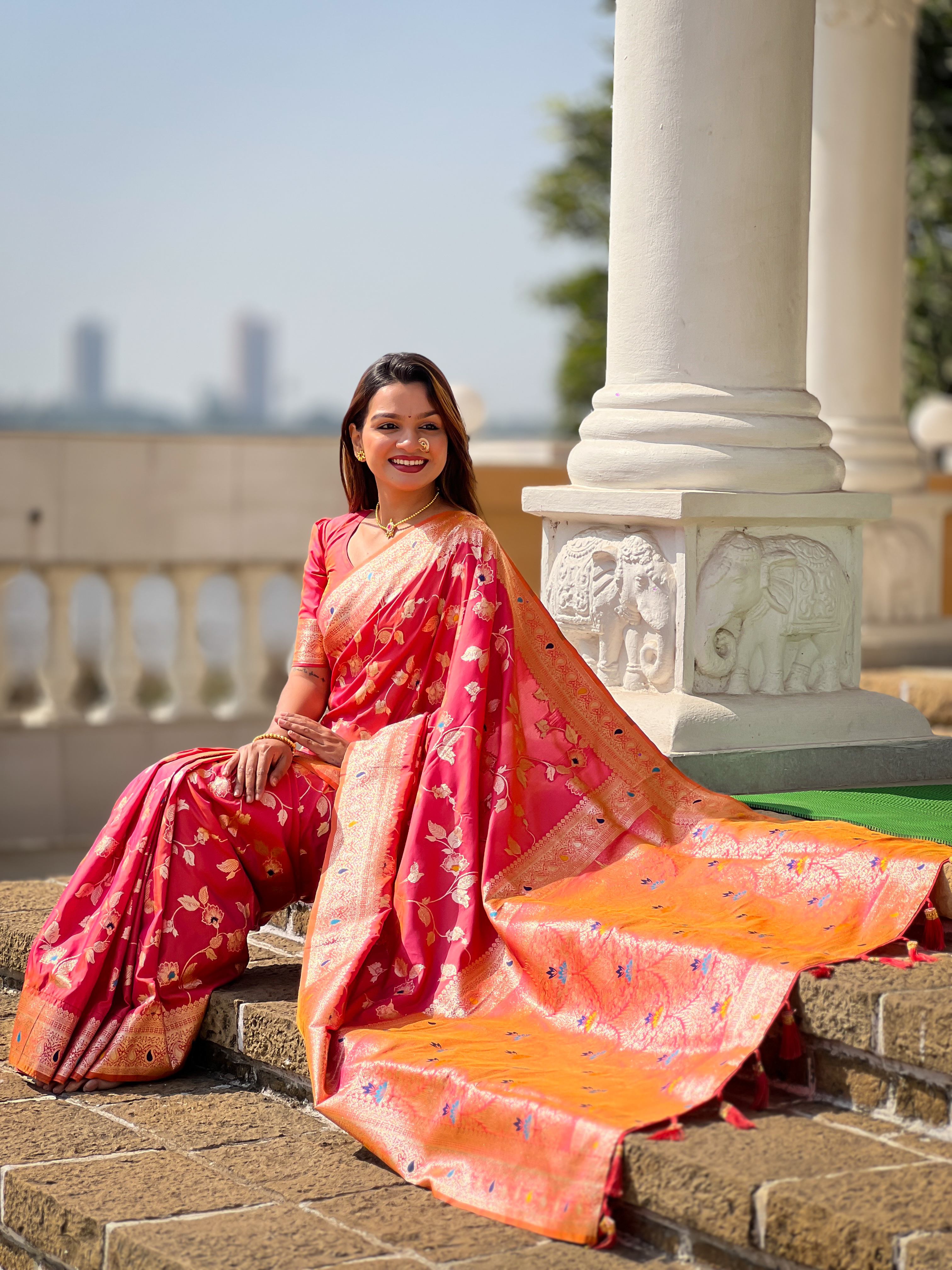 Radiate grace with this enchanting pink Banarasi silk saree