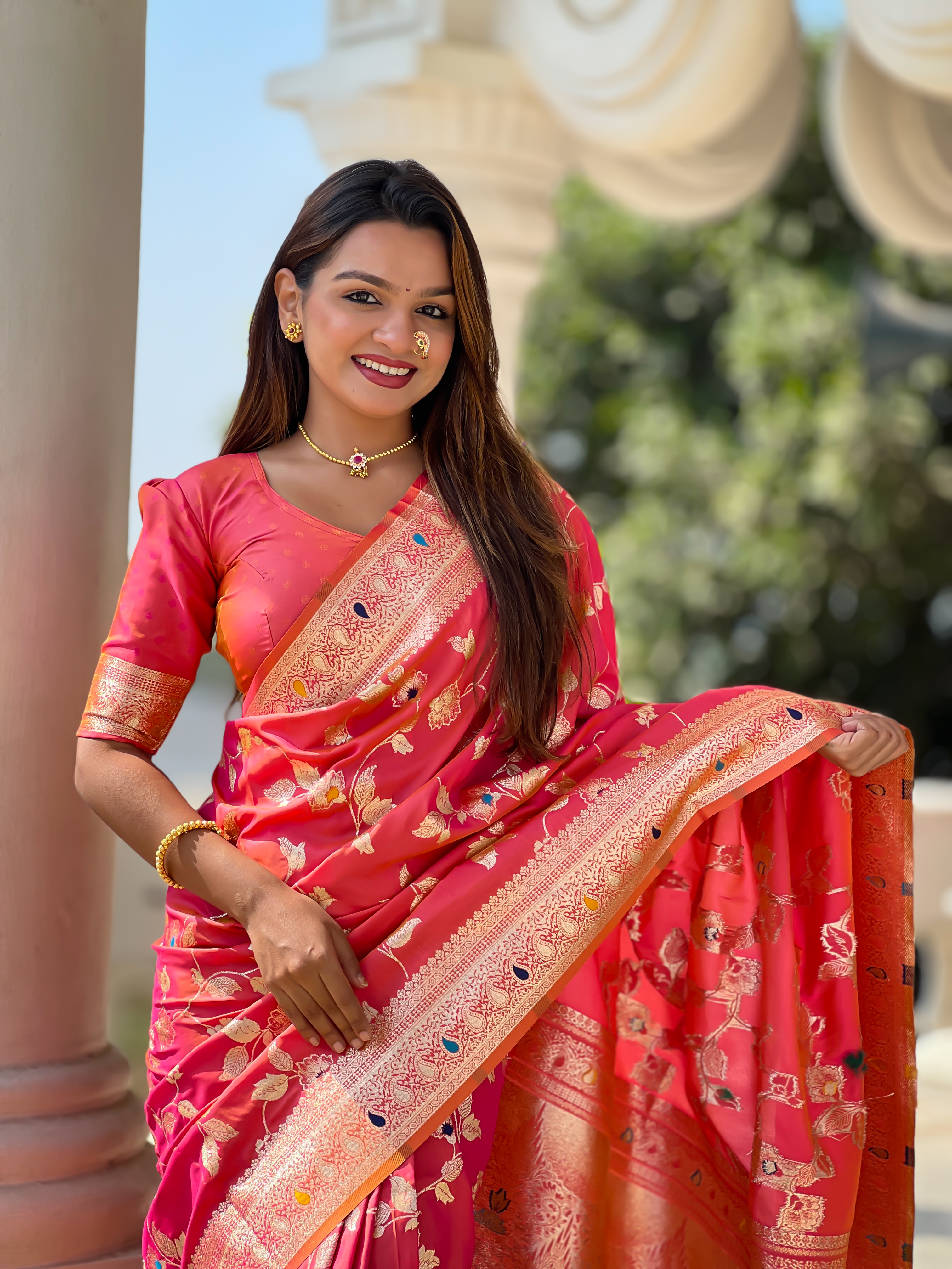 Radiate grace with this enchanting pink Banarasi silk saree