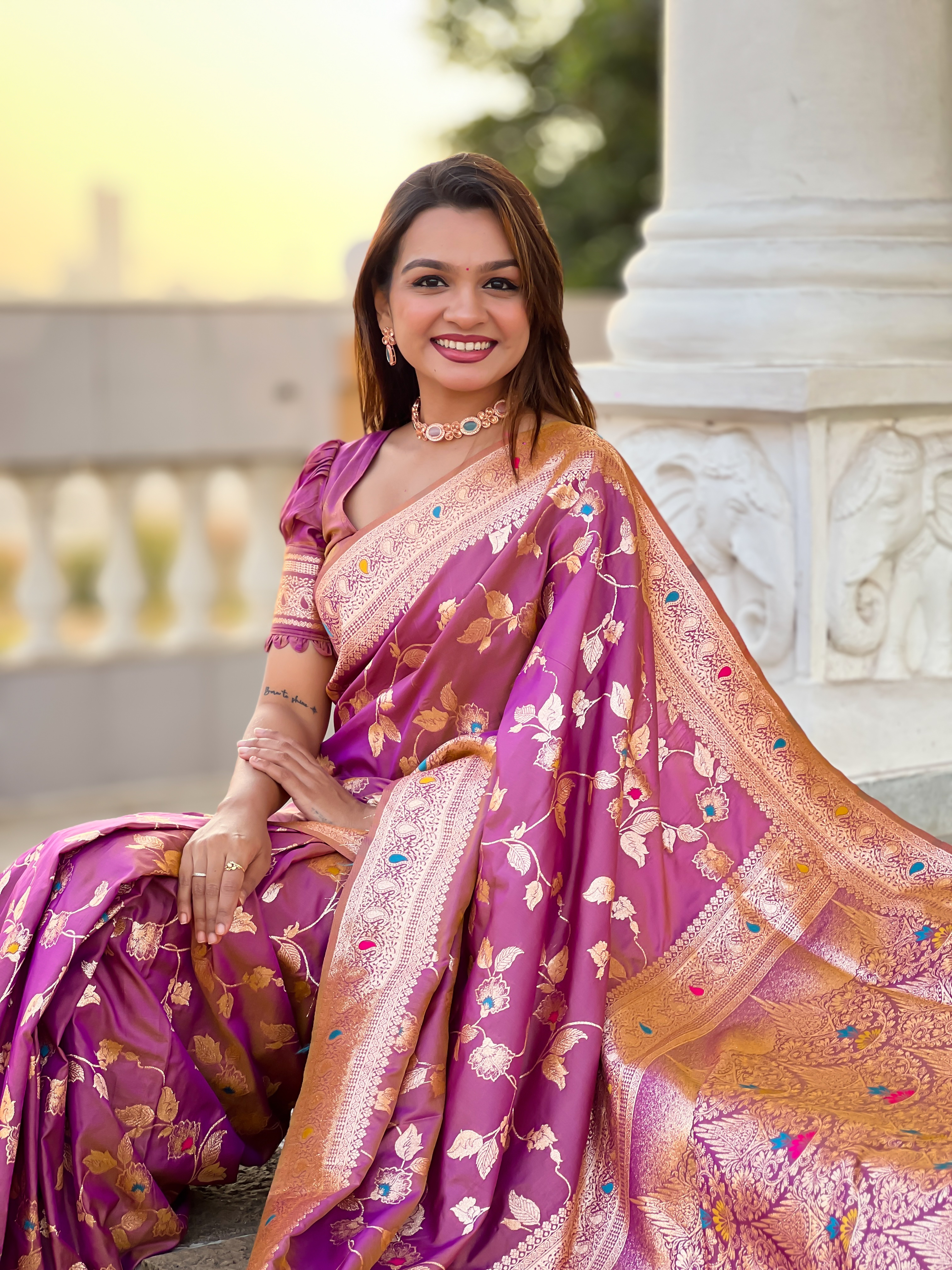 Embrace grace and tradition with this exquisite onion pink Banarasi silk saree