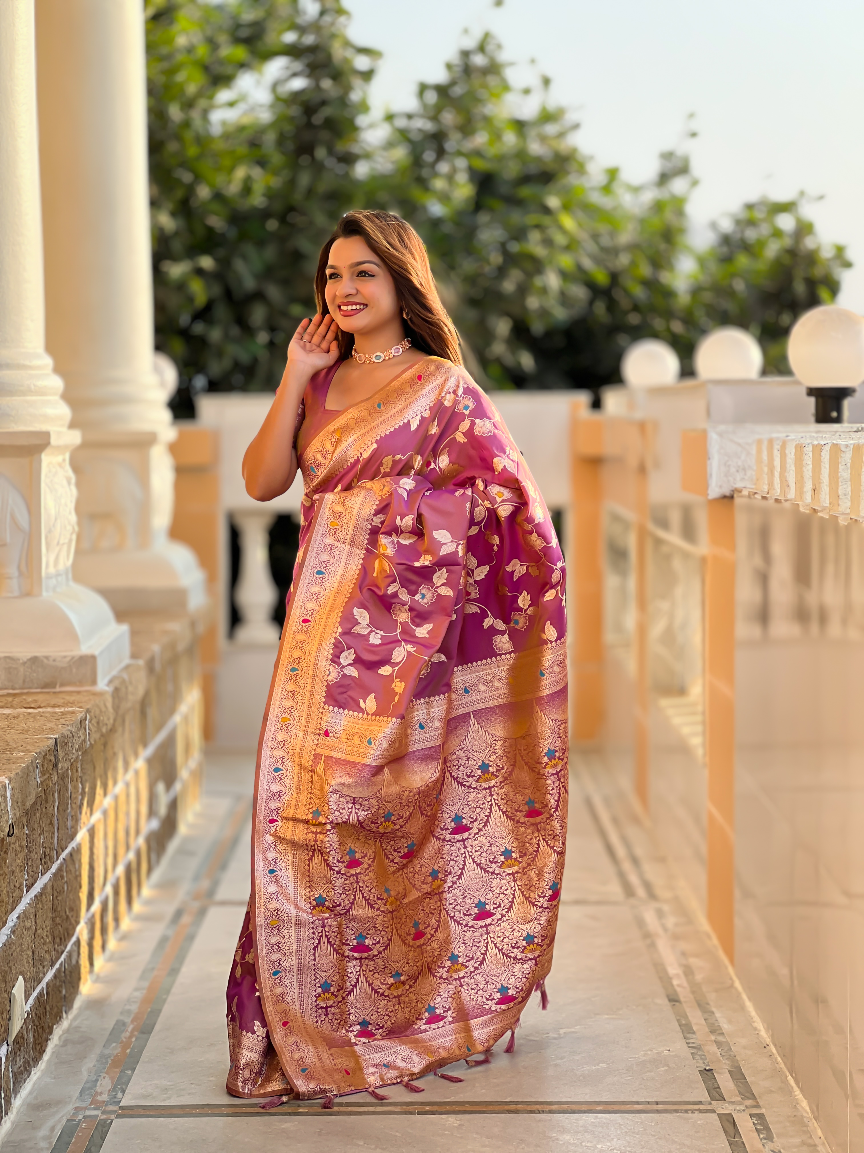 Embrace grace and tradition with this exquisite onion pink Banarasi silk saree