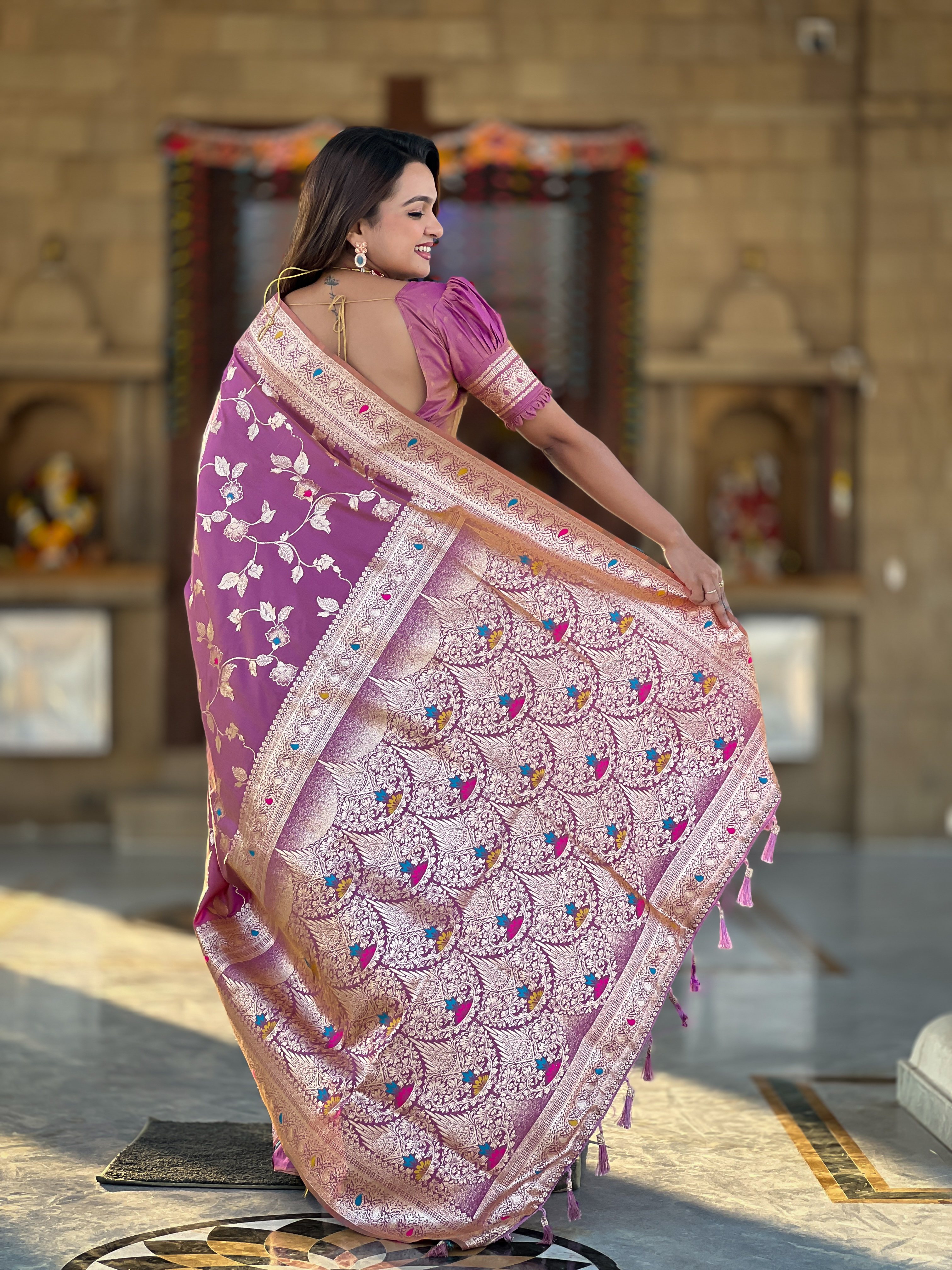 Embrace grace and tradition with this exquisite onion pink Banarasi silk saree
