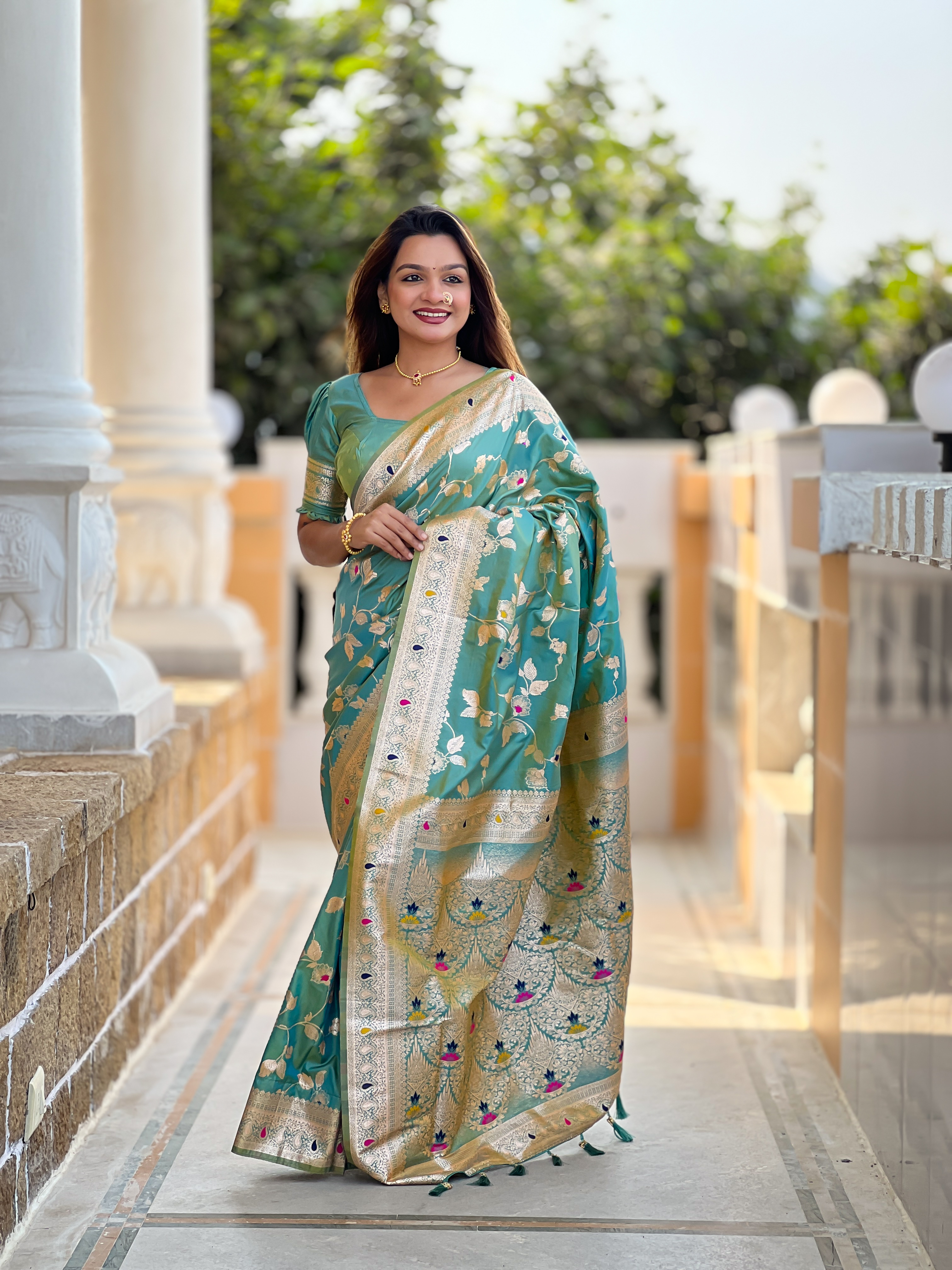 Elevate your ethnic wardrobe with this exquisite pistachio green Banarasi silk saree