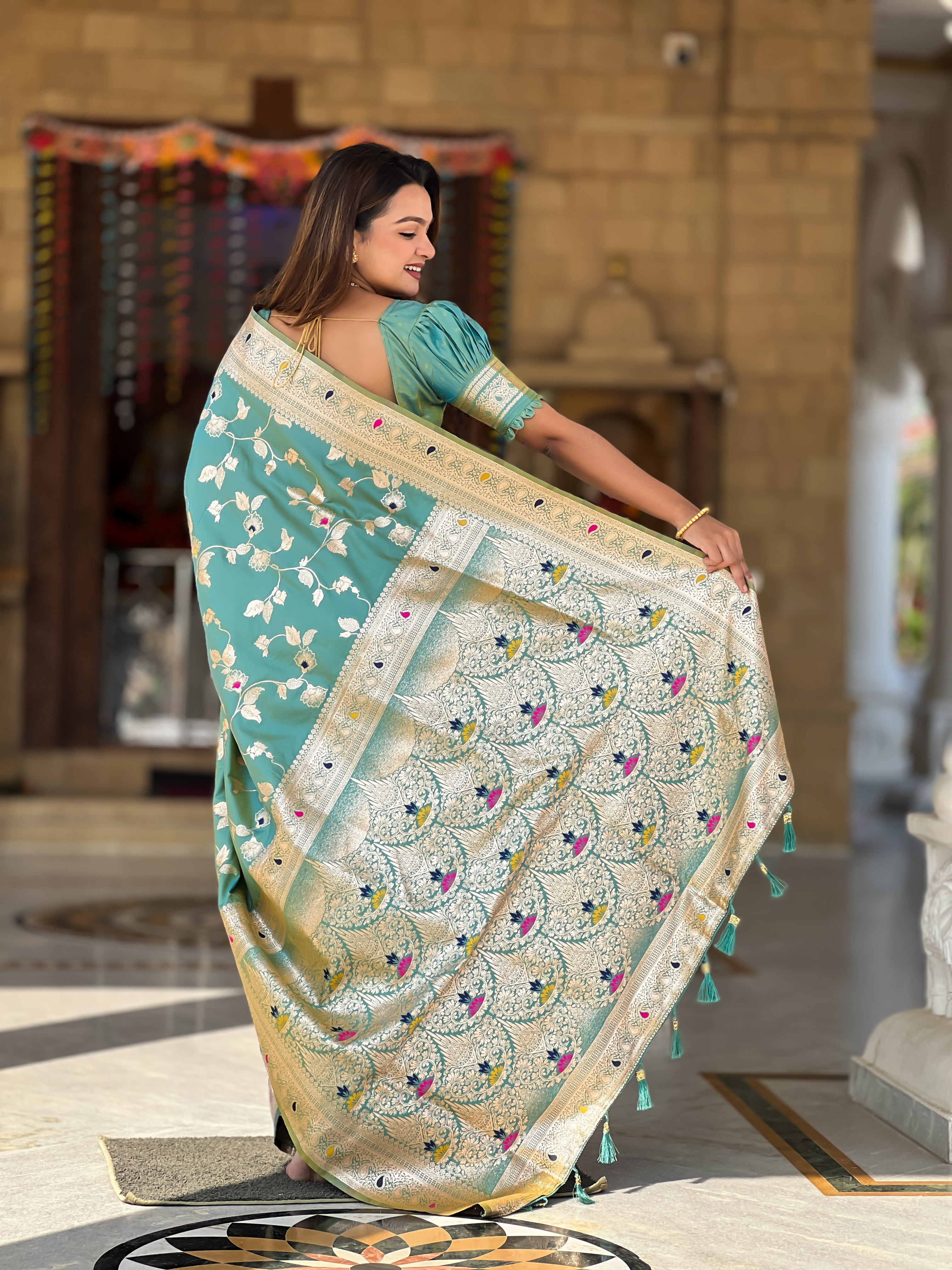 Elevate your ethnic wardrobe with this exquisite pistachio green Banarasi silk saree