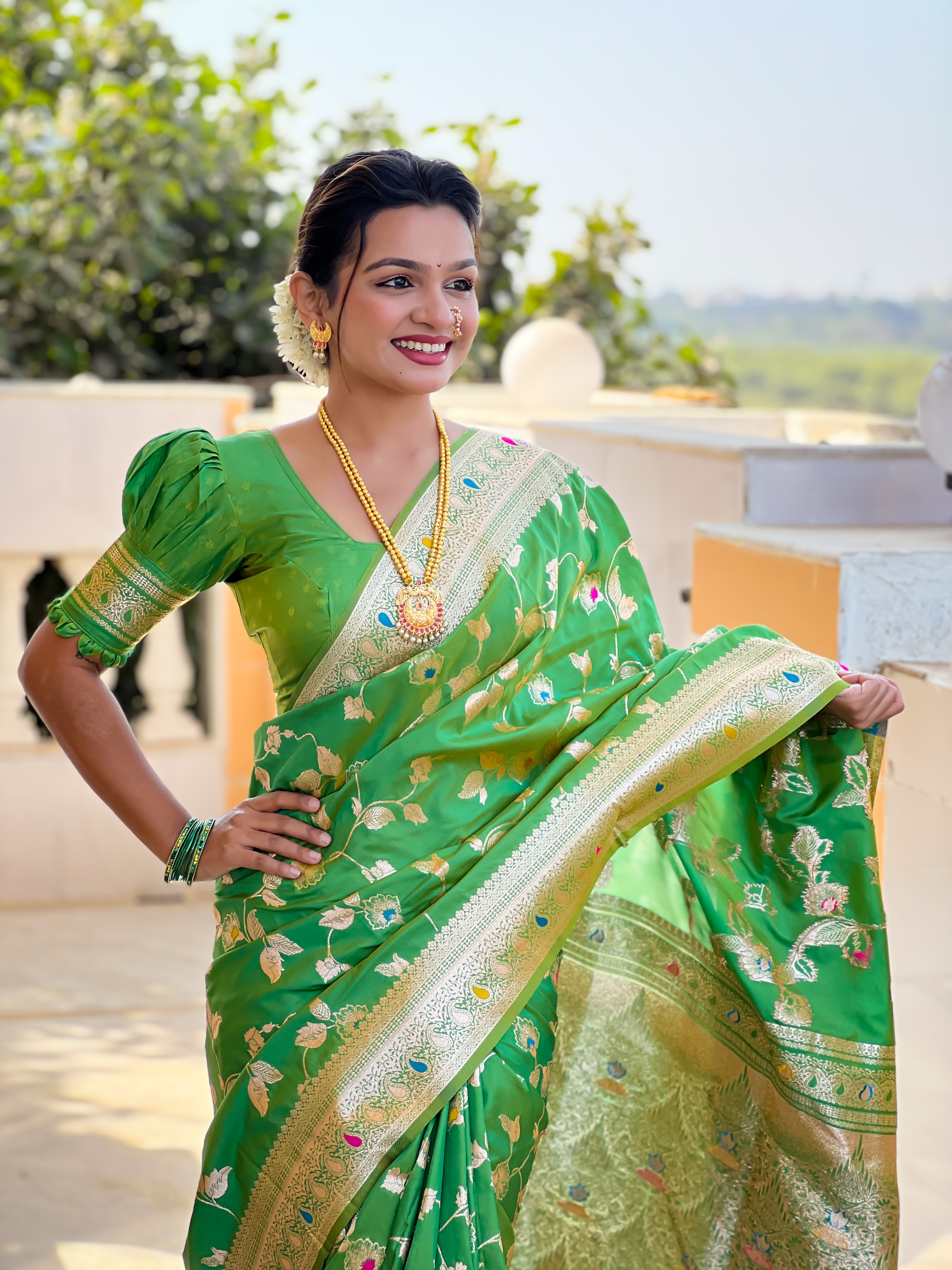 Brighten up your look with this radiant parrot green Banarasi silk saree