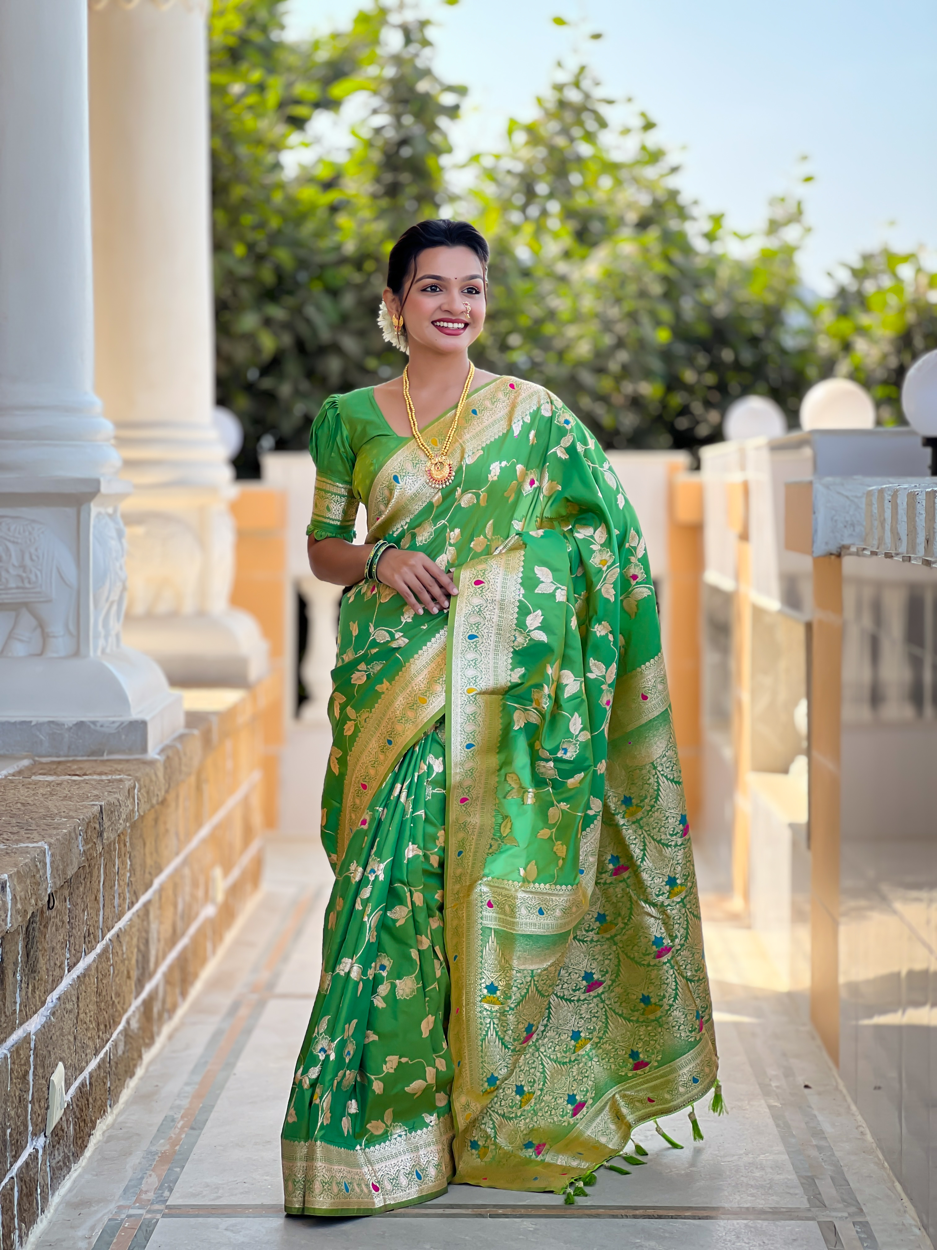 Brighten up your look with this radiant parrot green Banarasi silk saree