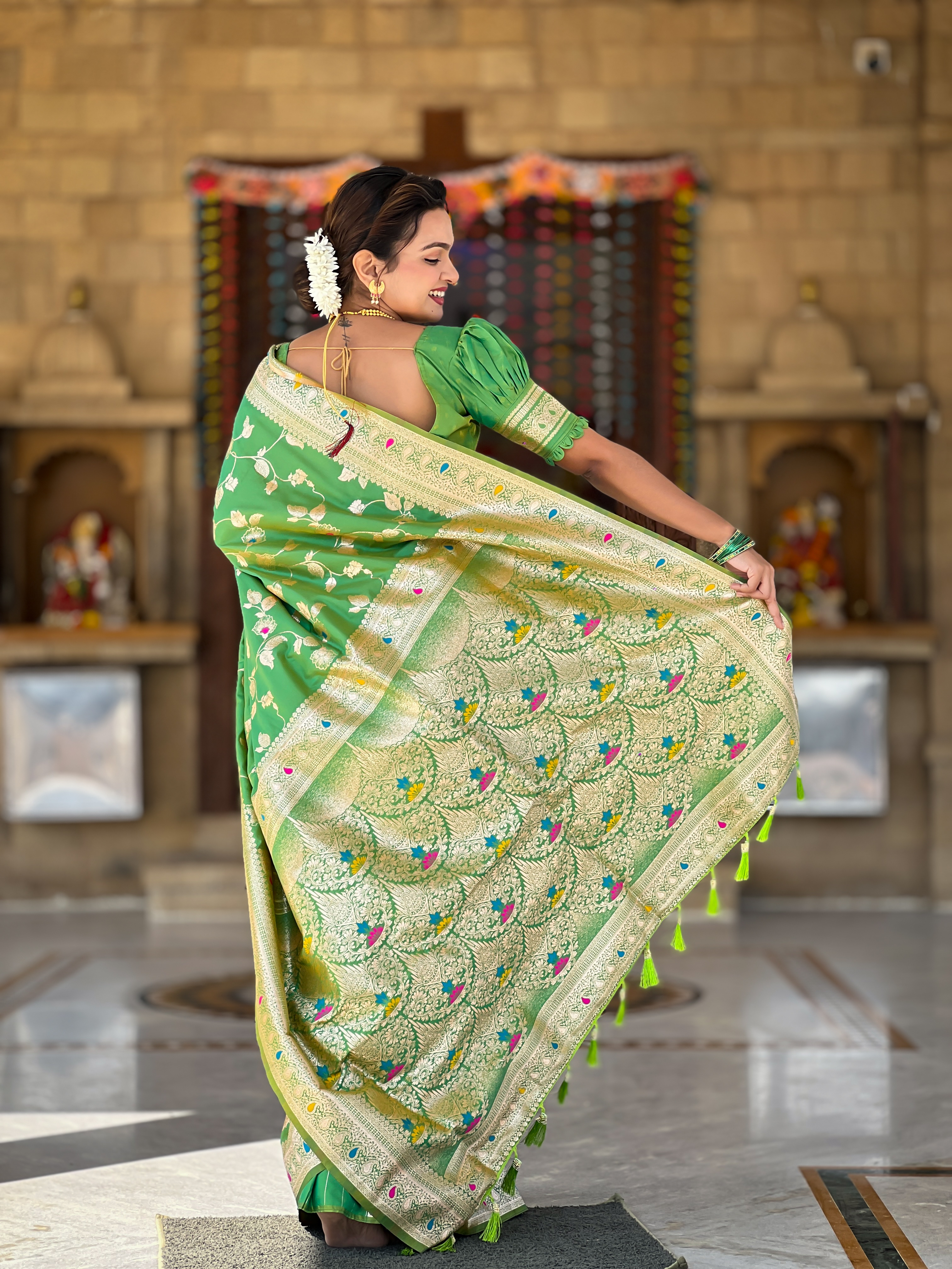 Brighten up your look with this radiant parrot green Banarasi silk saree