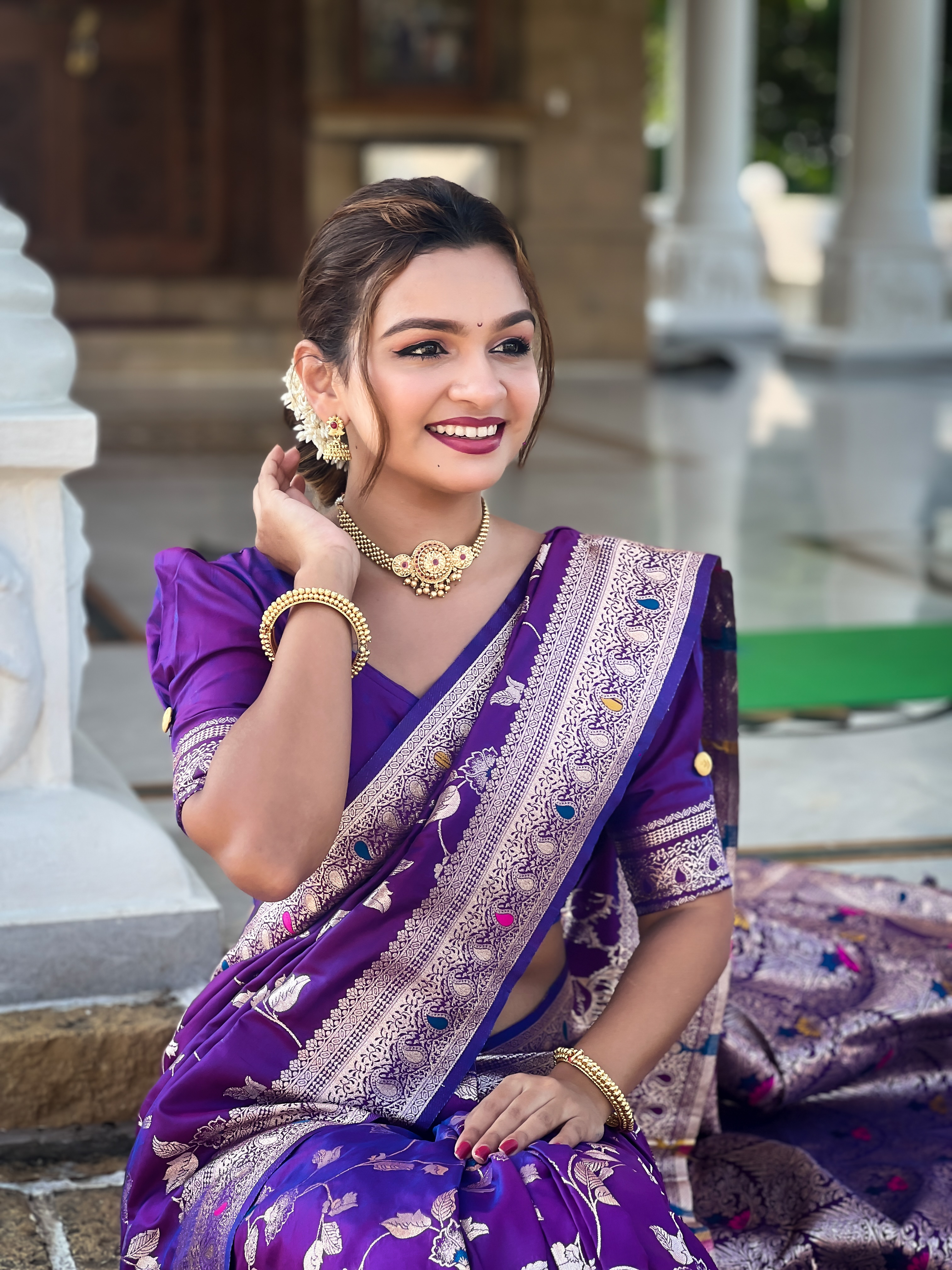 Make a statement with this enchanting purple Banarasi silk saree