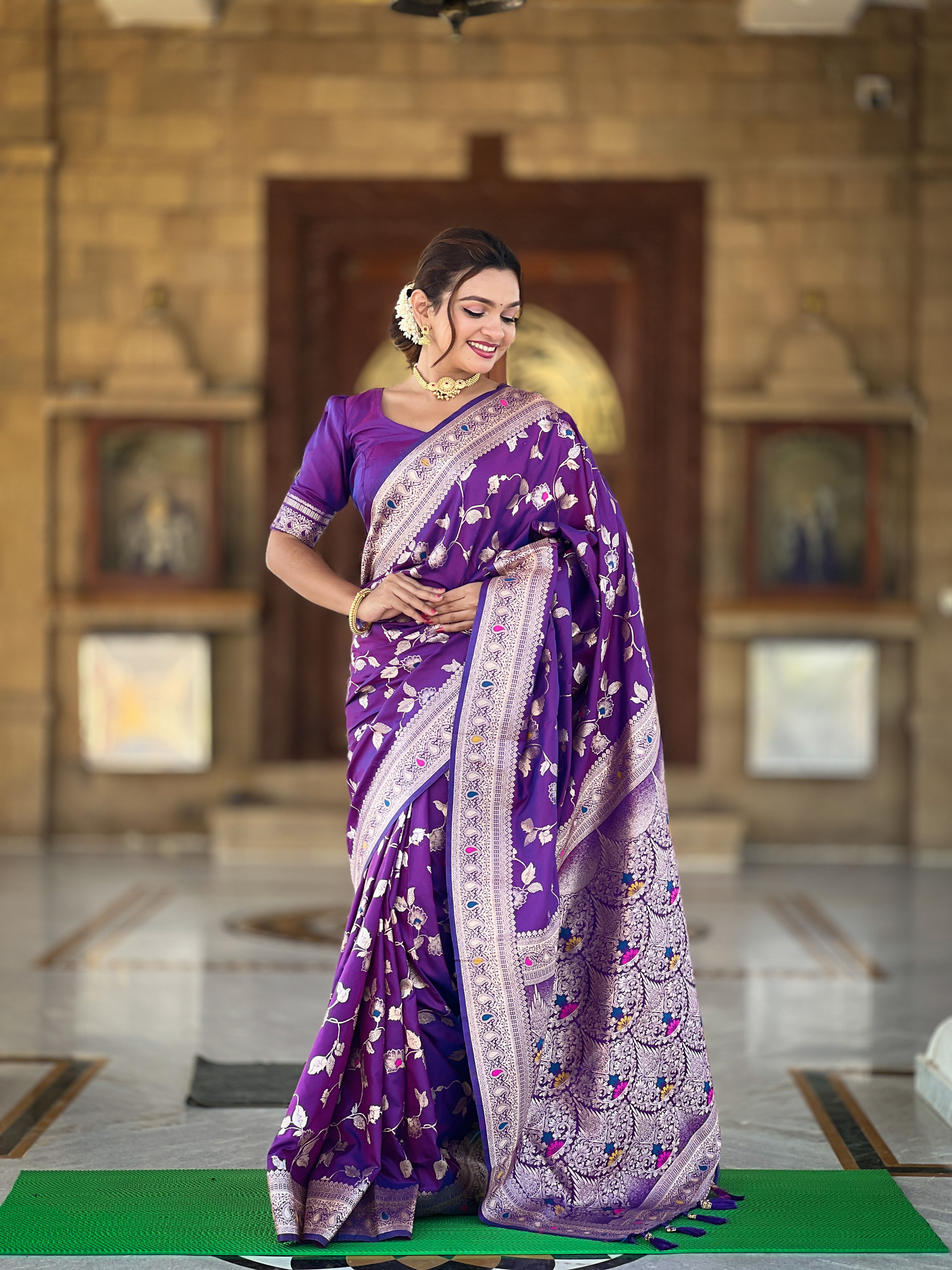 Make a statement with this enchanting purple Banarasi silk saree