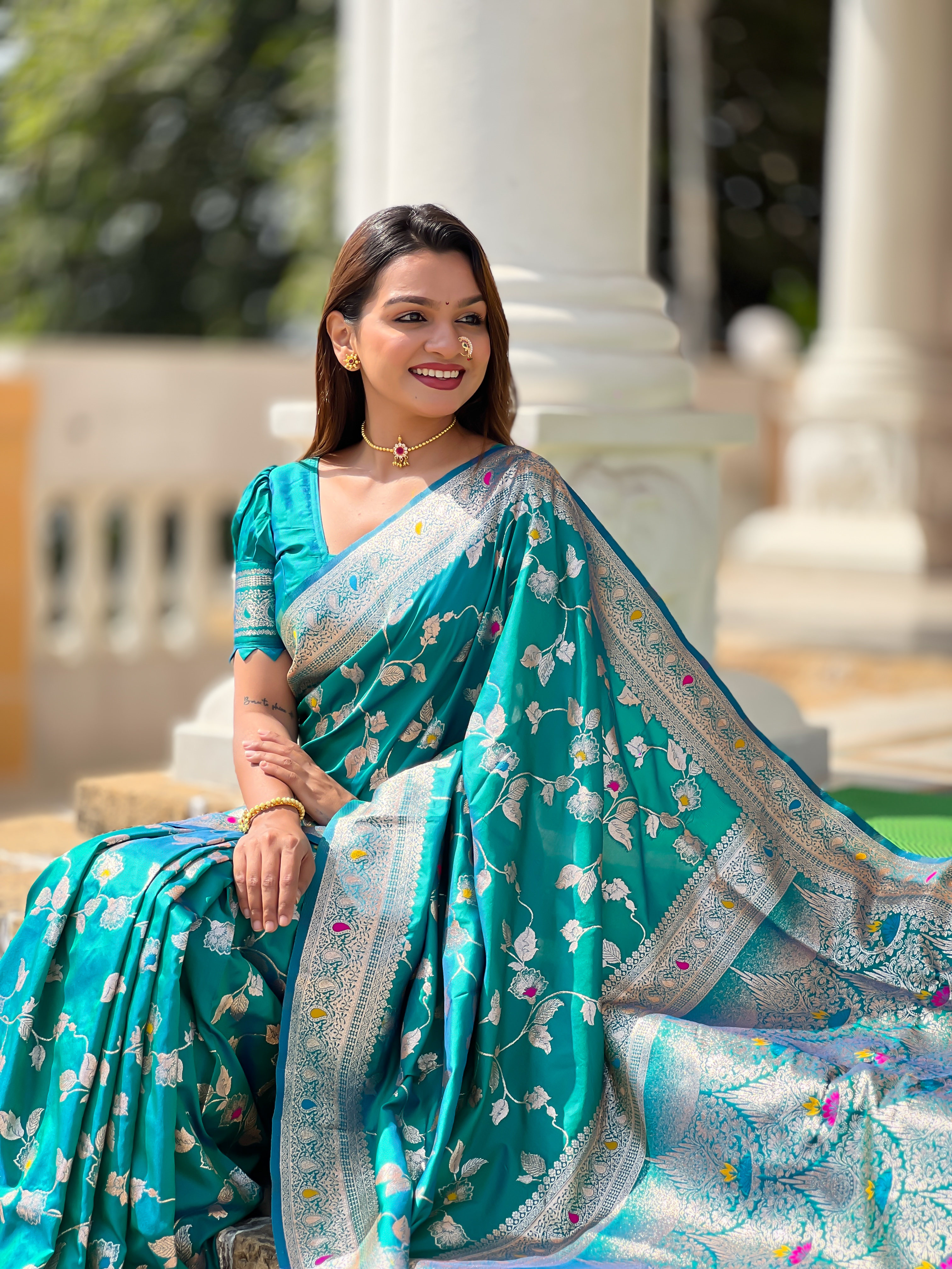 Drape yourself in the elegance of this stunning Rama green Banarasi silk saree