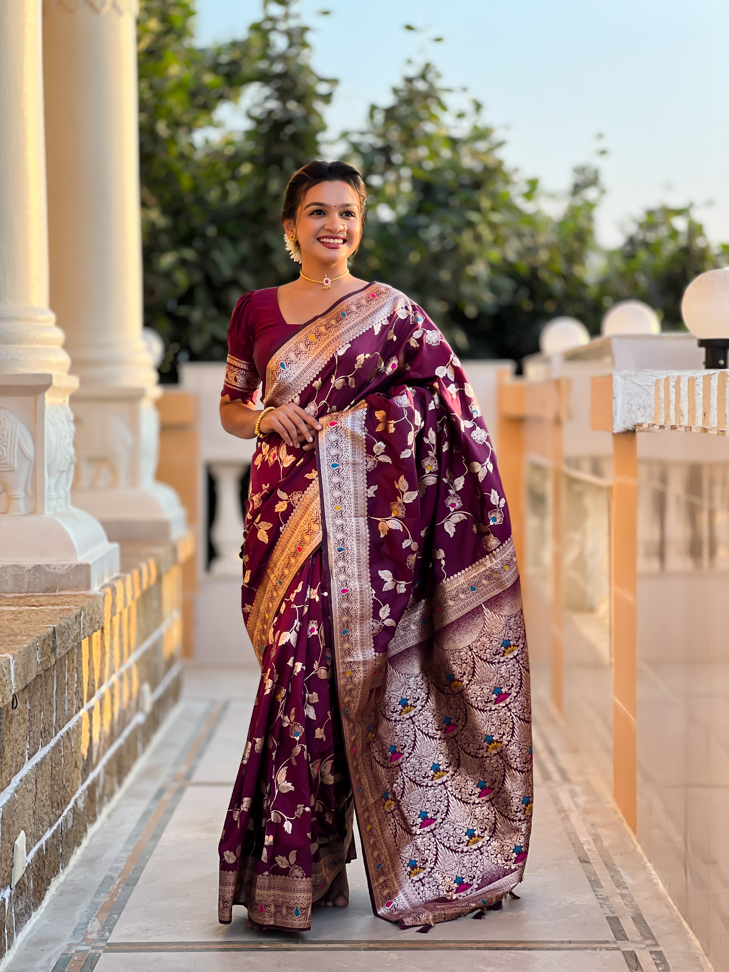 Indulge in the opulence of this wine Banarasi silk saree