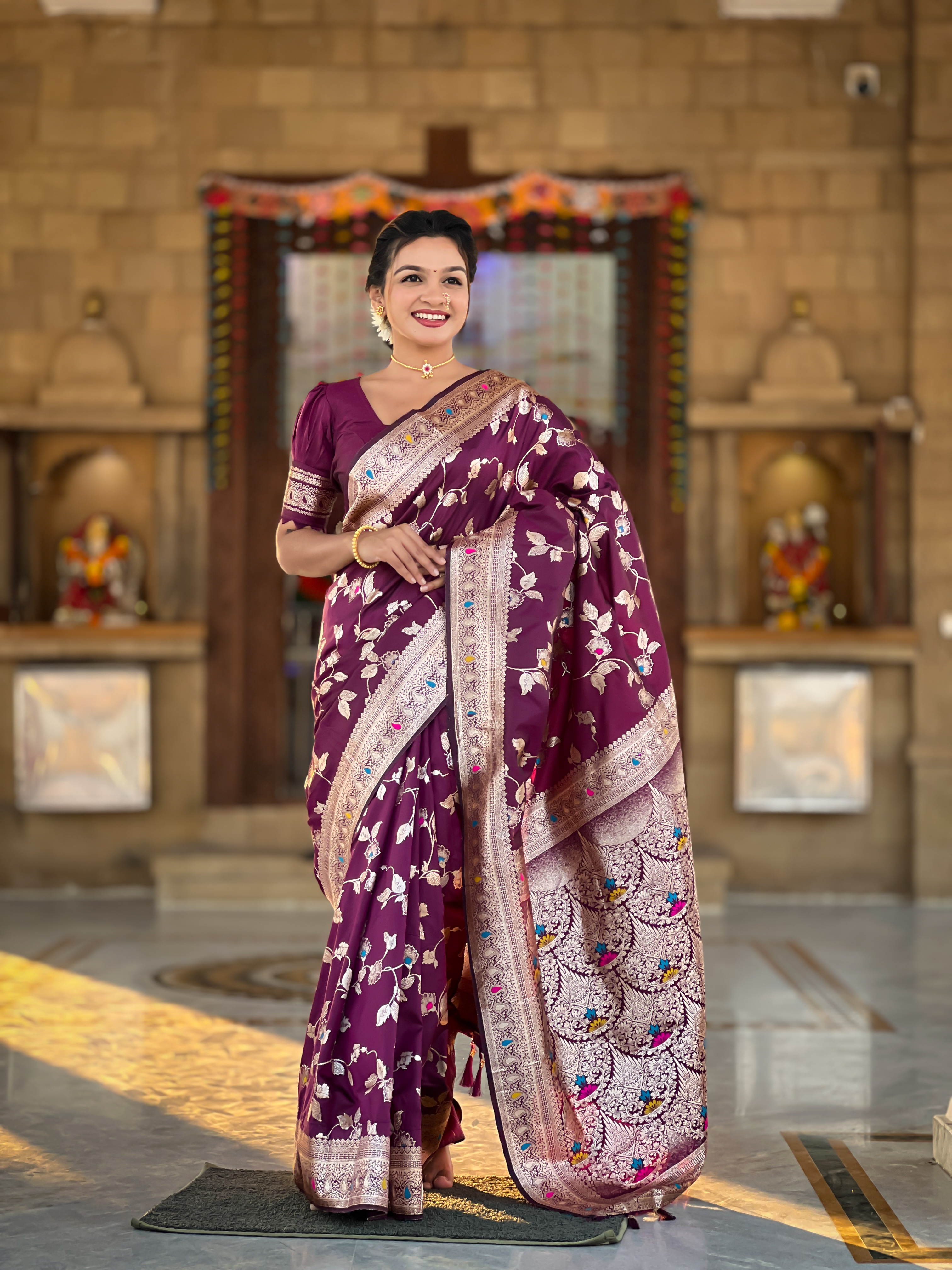 Indulge in the opulence of this wine Banarasi silk saree