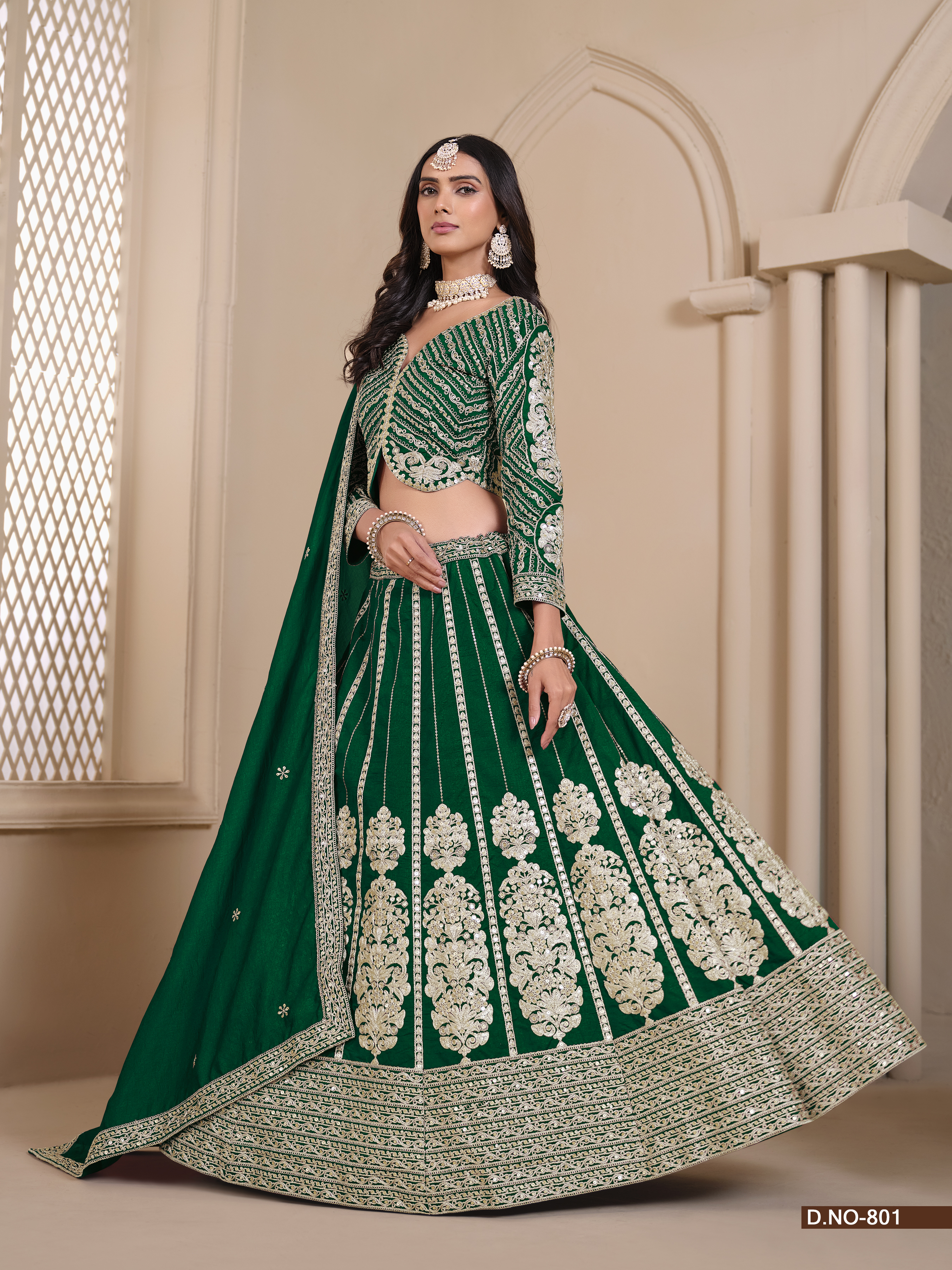 This exquisite green shimmer art silk umbrella lehenga is a true masterpiece