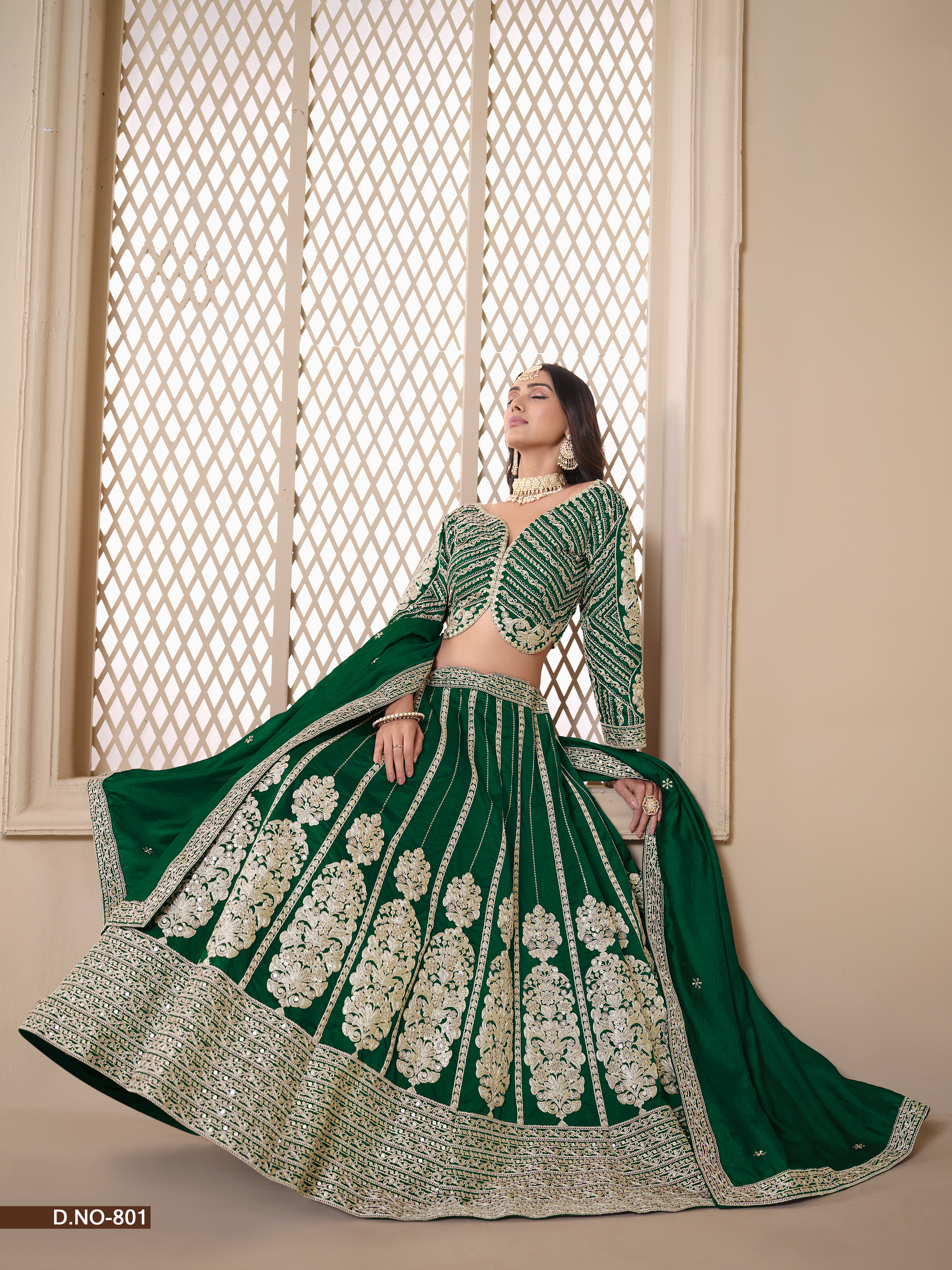 This exquisite green shimmer art silk umbrella lehenga is a true masterpiece