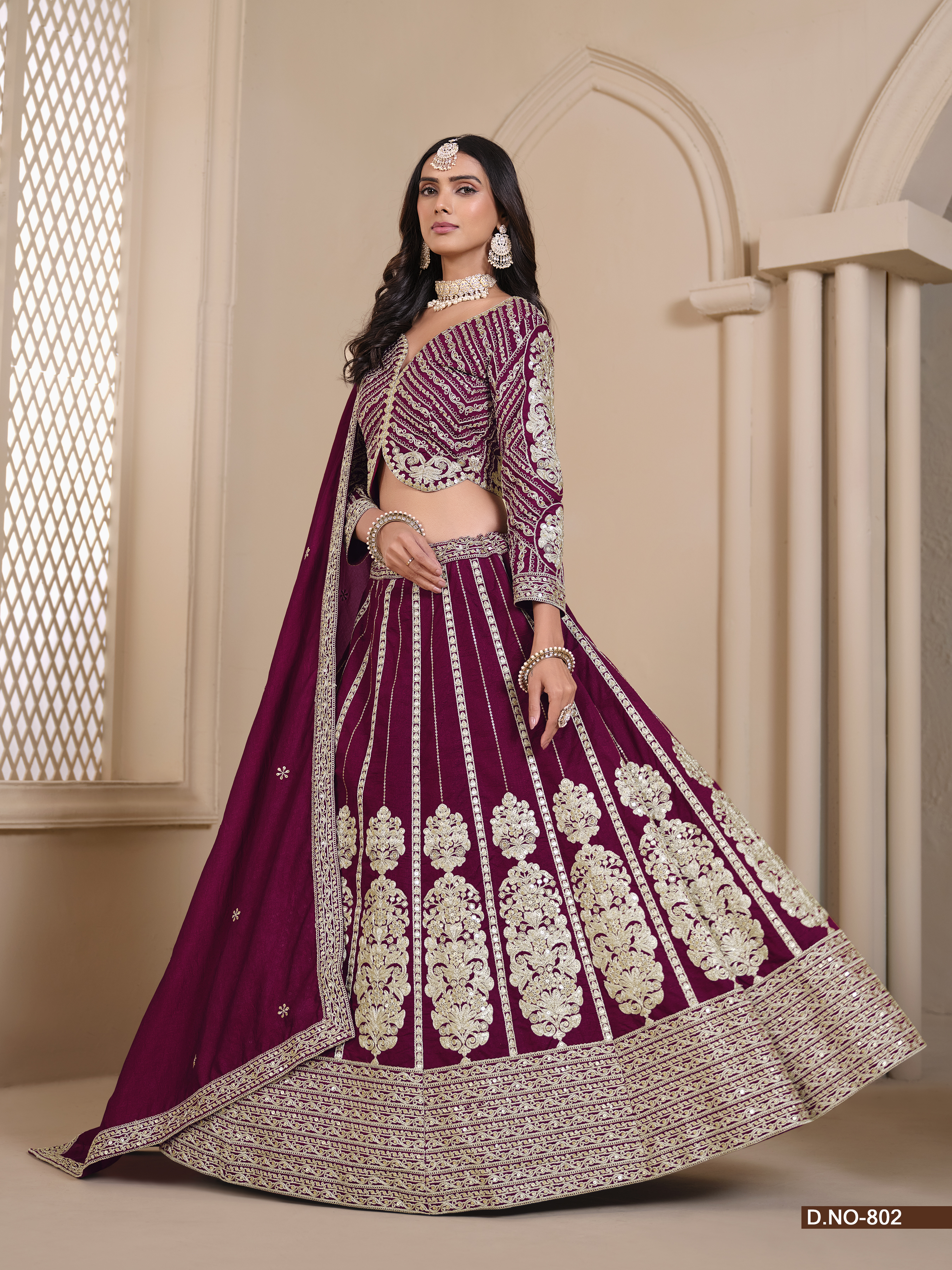 This exquisite wine shimmer art silk umbrella lehenga