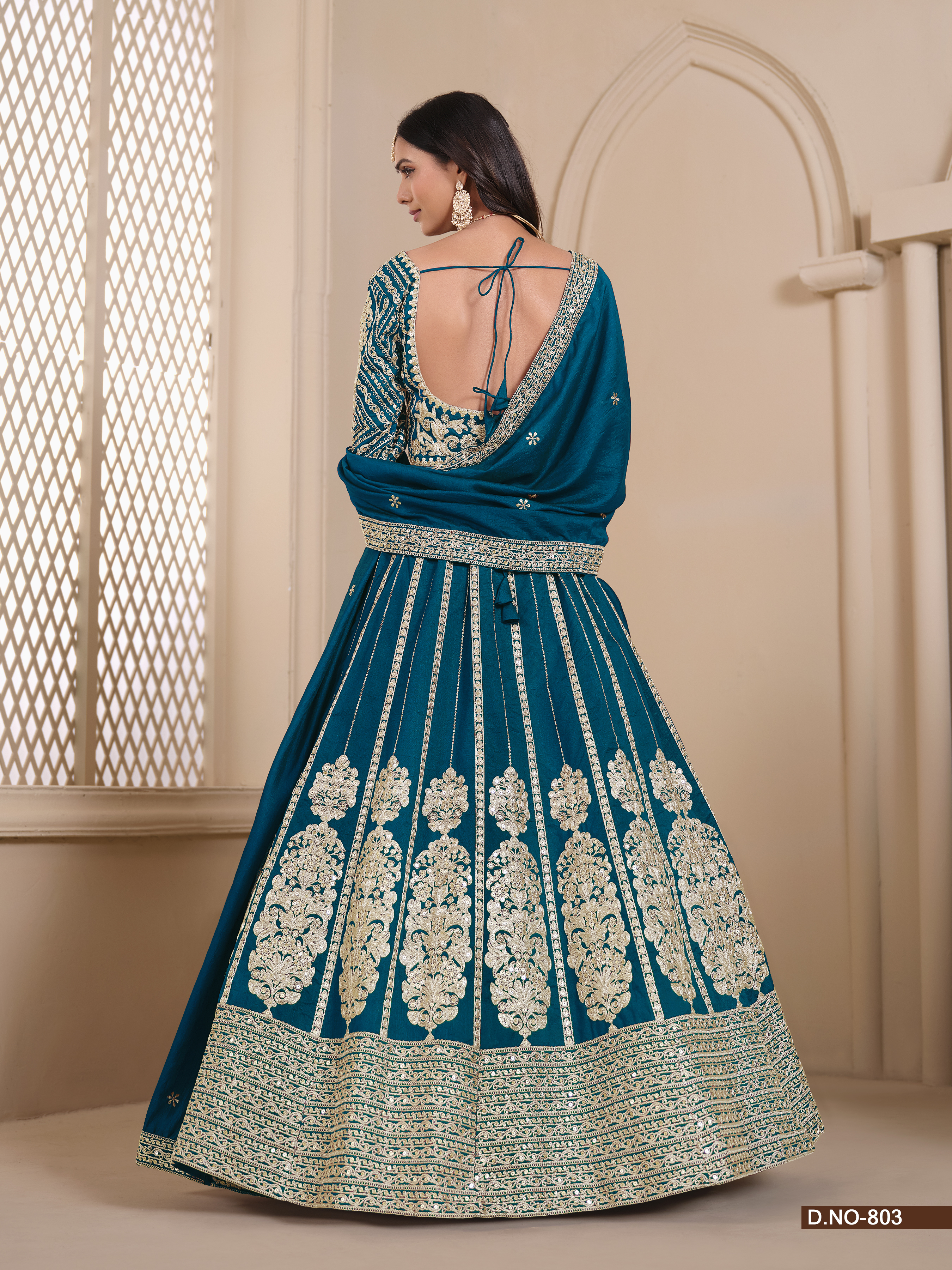 Step into elegance with this mesmerizing blue shimmer art silk umbrella lehenga