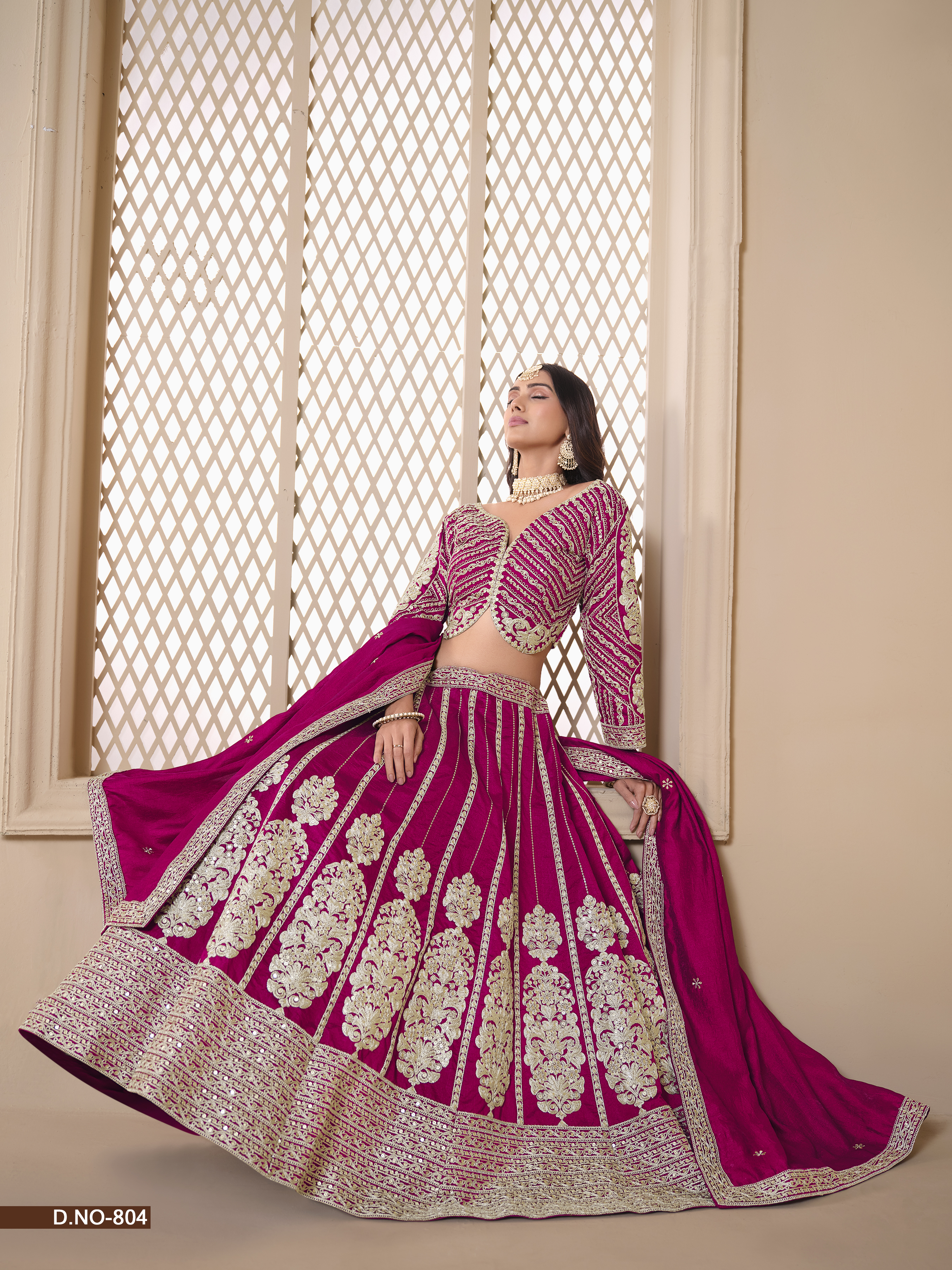 Radiate charm and elegance in this breathtaking pink shimmer art silk umbrella lehenga