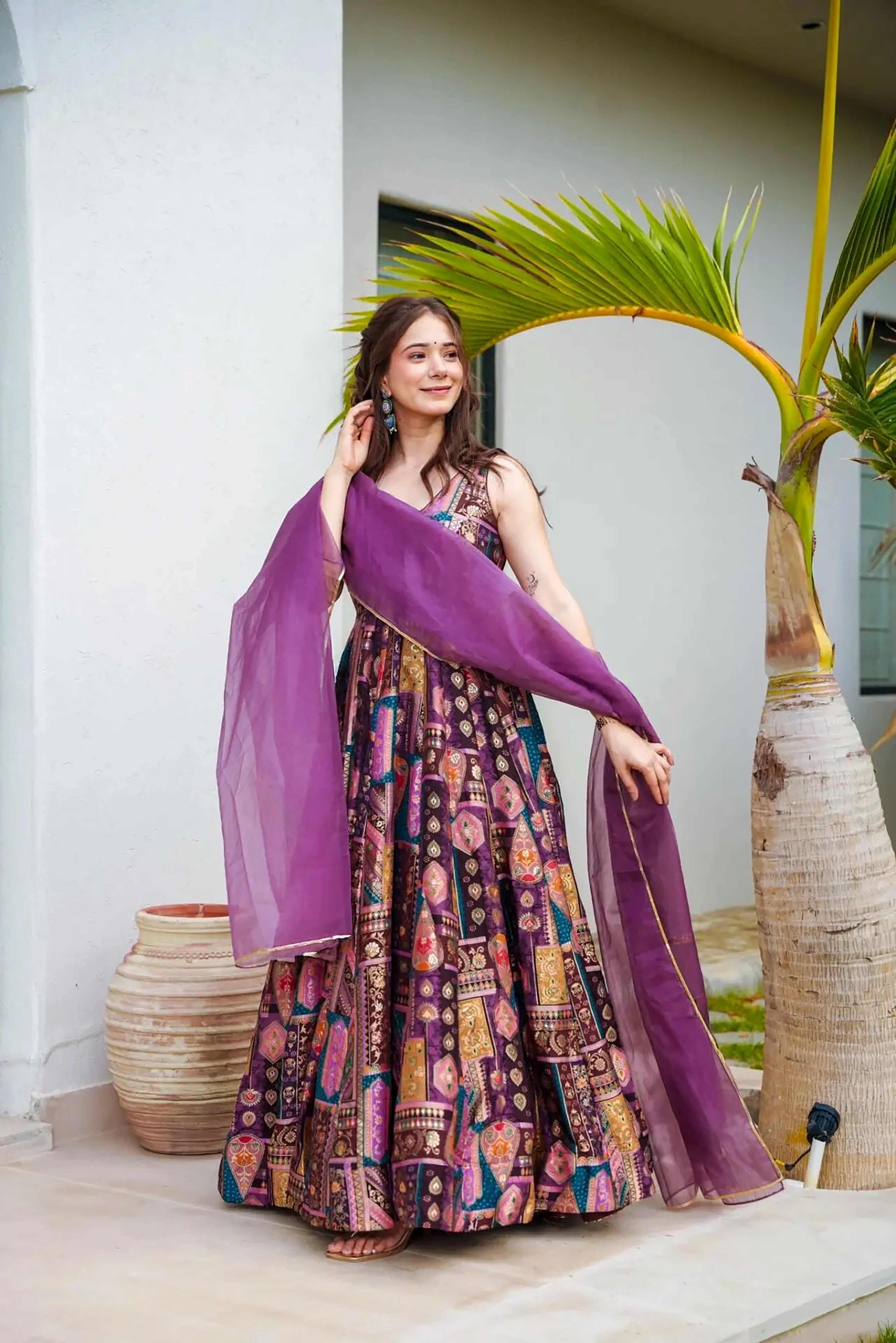 Embrace a chic and sophisticated look with this lavender silk long gown