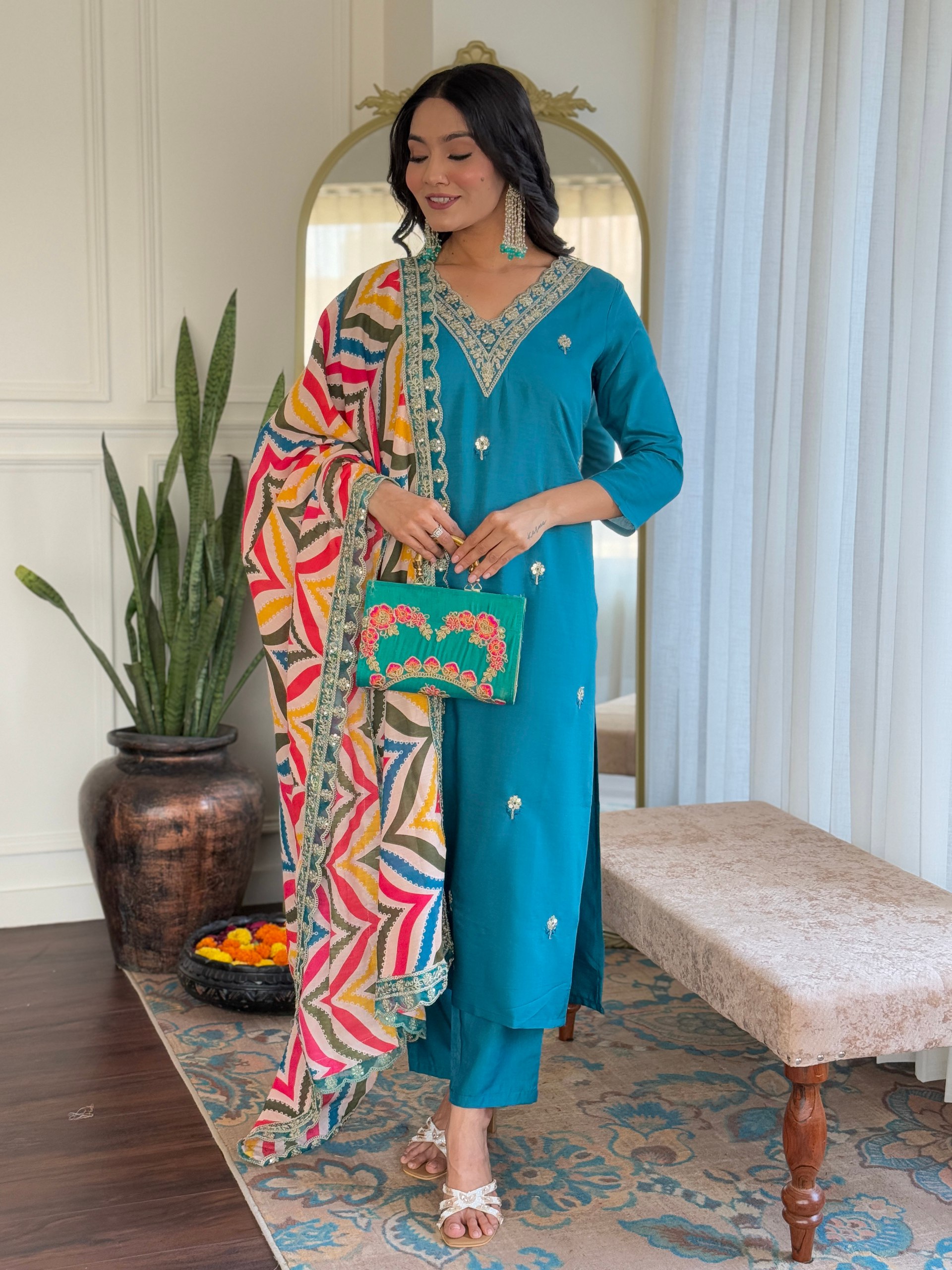 Step into elegance this Eid with this stunning Firozi salwar kameez