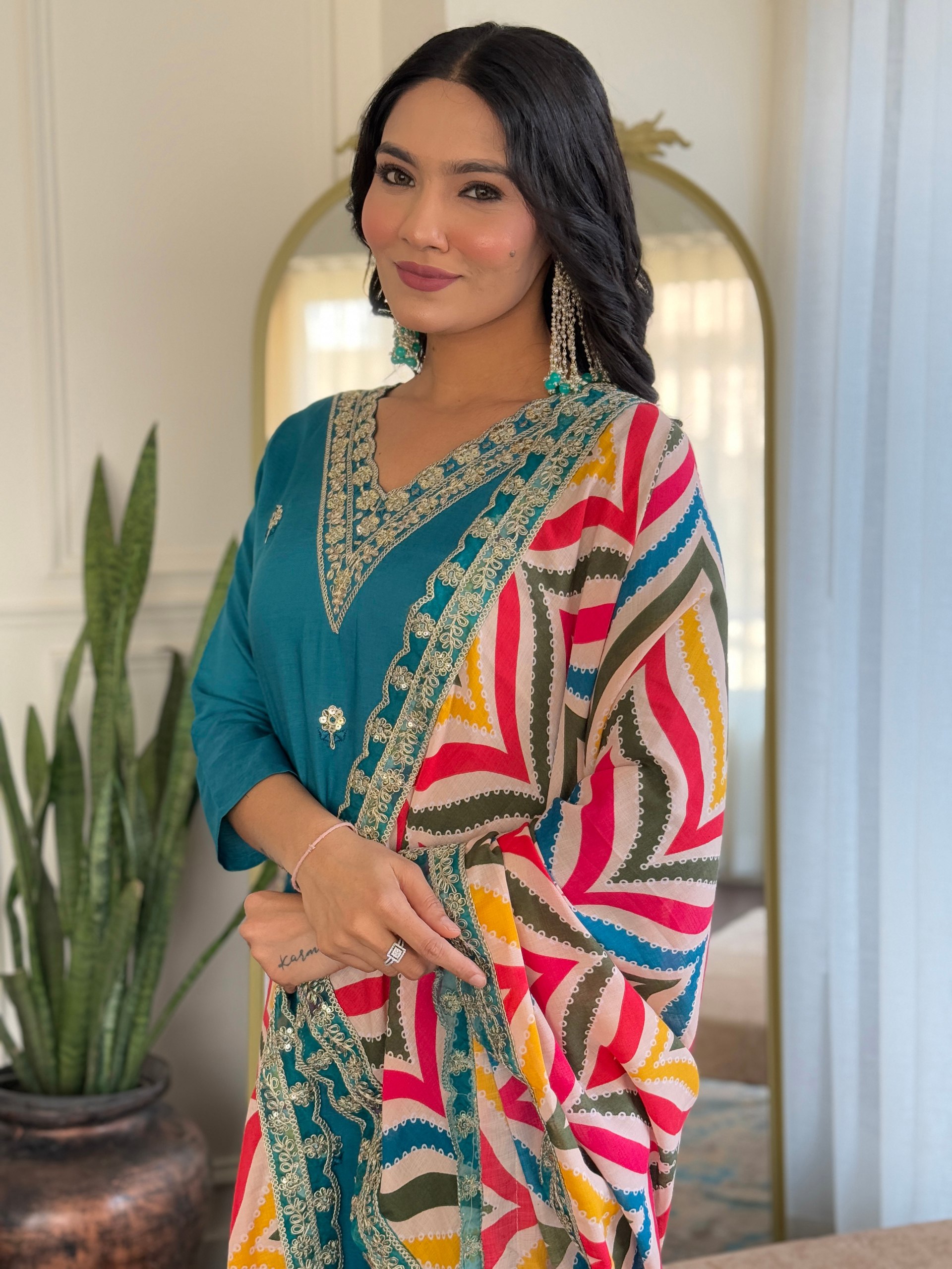 Step into elegance this Eid with this stunning Firozi salwar kameez